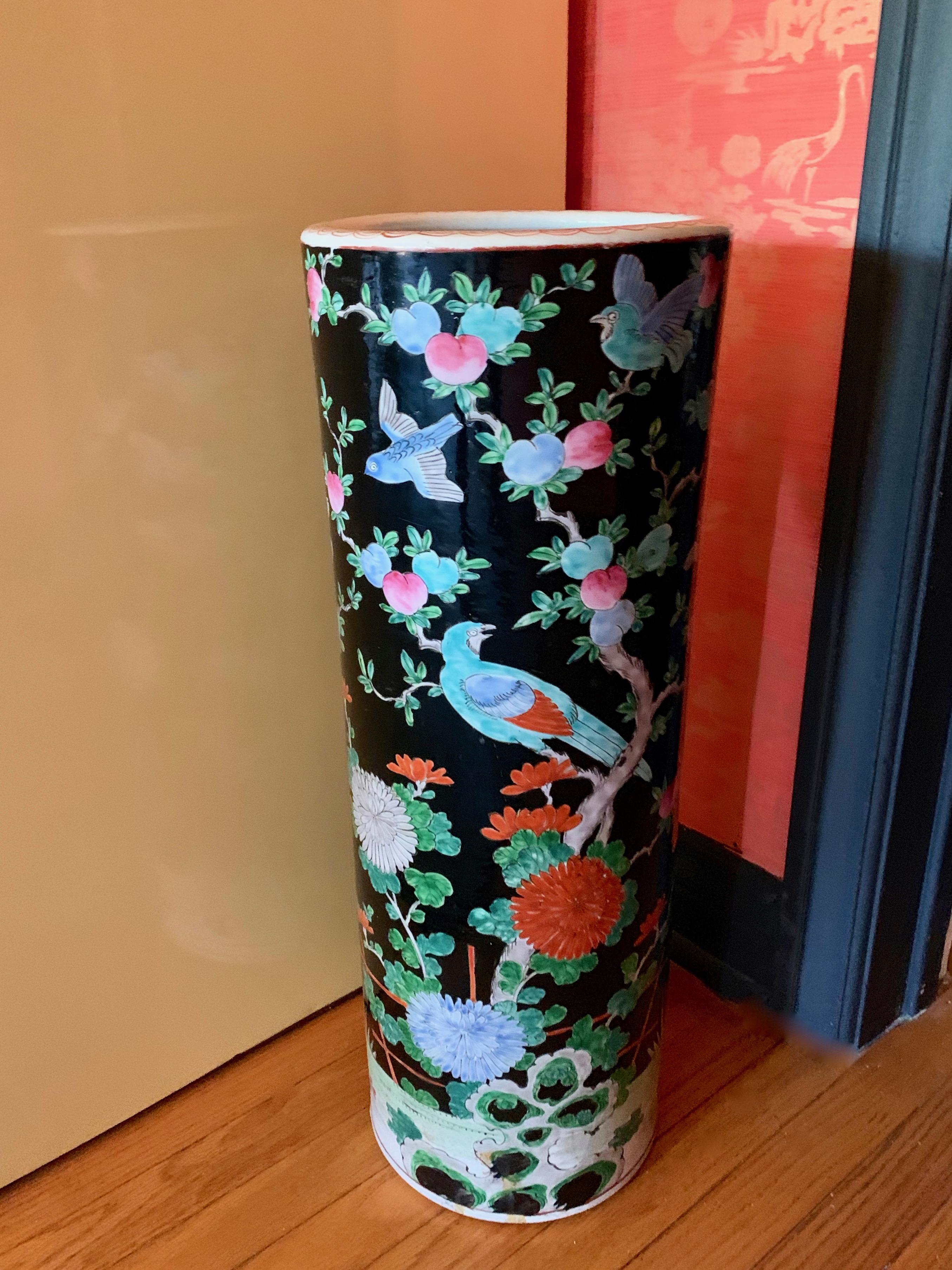 Porcelain Chinese umbrella Stand vase - Classic bold colors in designs of flowers, birds, and foliage. A handsome hand painted compliment to any entry, and at 18 pounds a substantial piece that will hold any number of umbrellas. Also a wonderfully