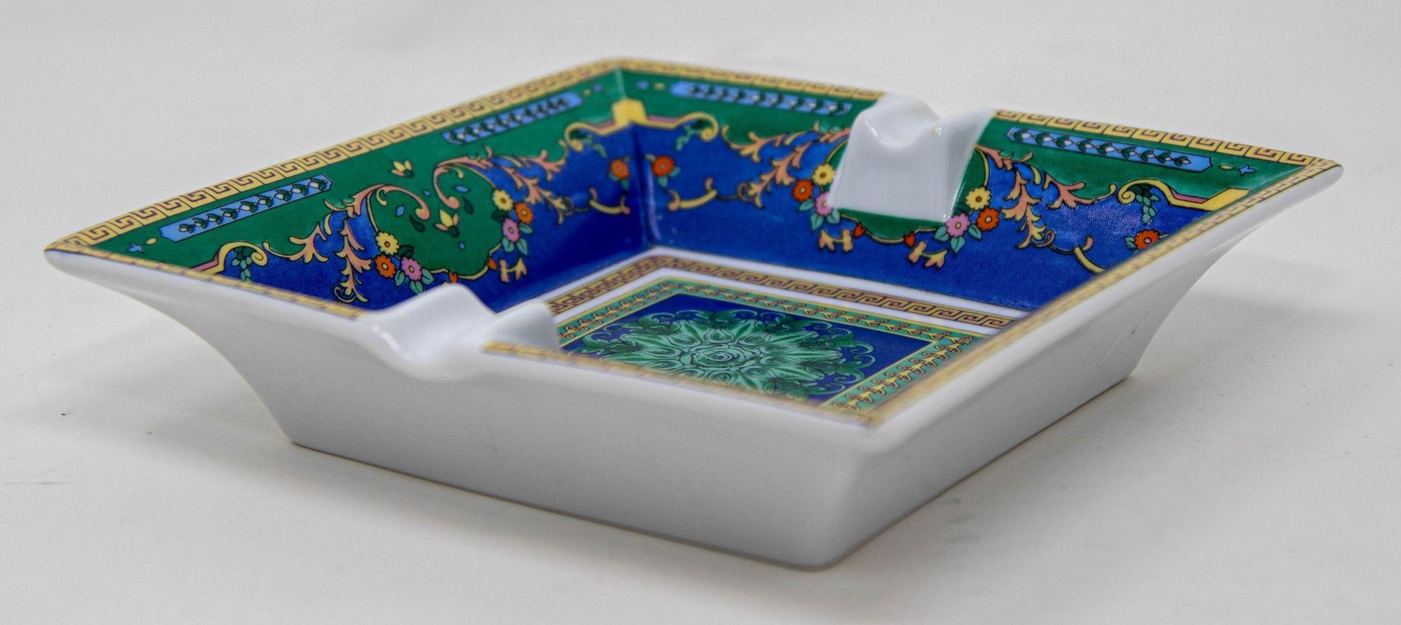 Porcelain Cigar Ashtray Dish Catchall Greco Roman Baroque Style Blue Green Gold.
Porcelain ashtray in a square shape featuring a Greco Roman Baroque Style in green and blue foliage and greek key in gold.
This large porcelain cigar ashtray can also