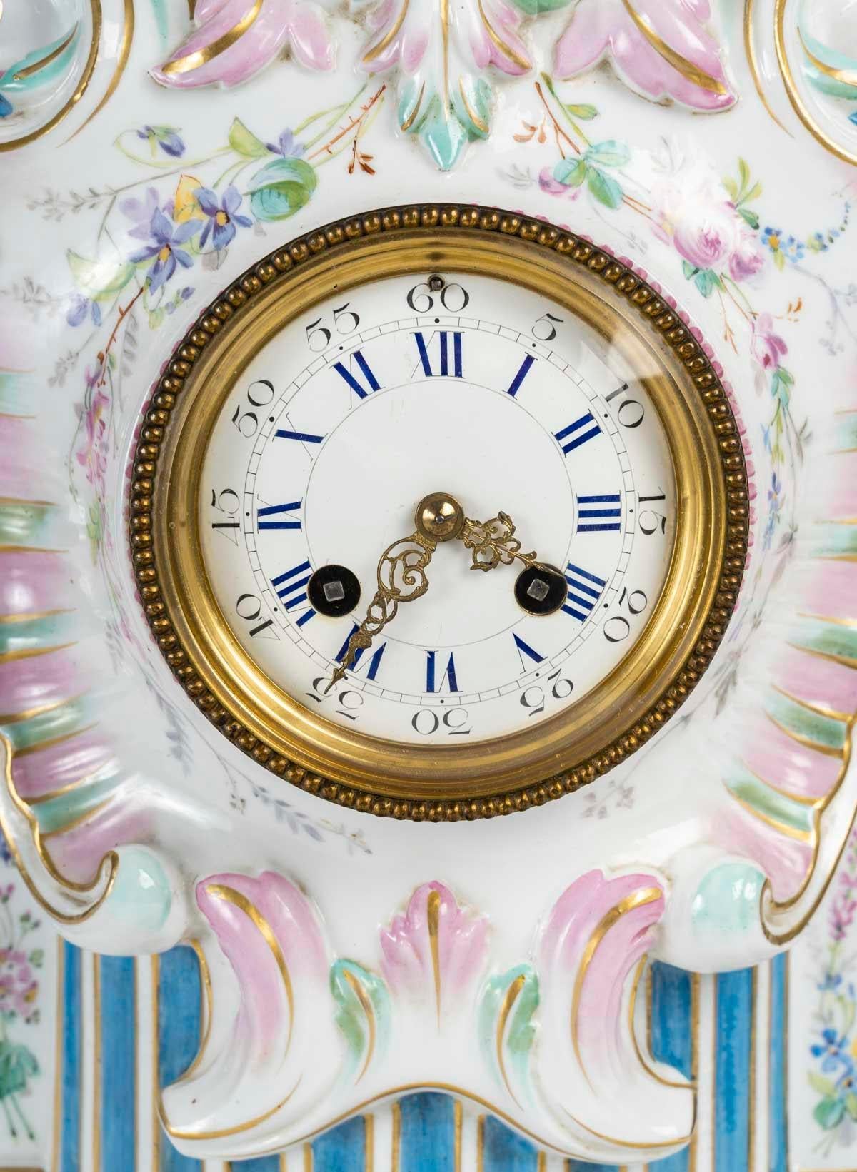 Porcelain clock, 19th century, Napoleon III period.

A 19th century Napoleon III period painted porcelain clock.
H: 40cm, W: 28cm, D: 17cm
