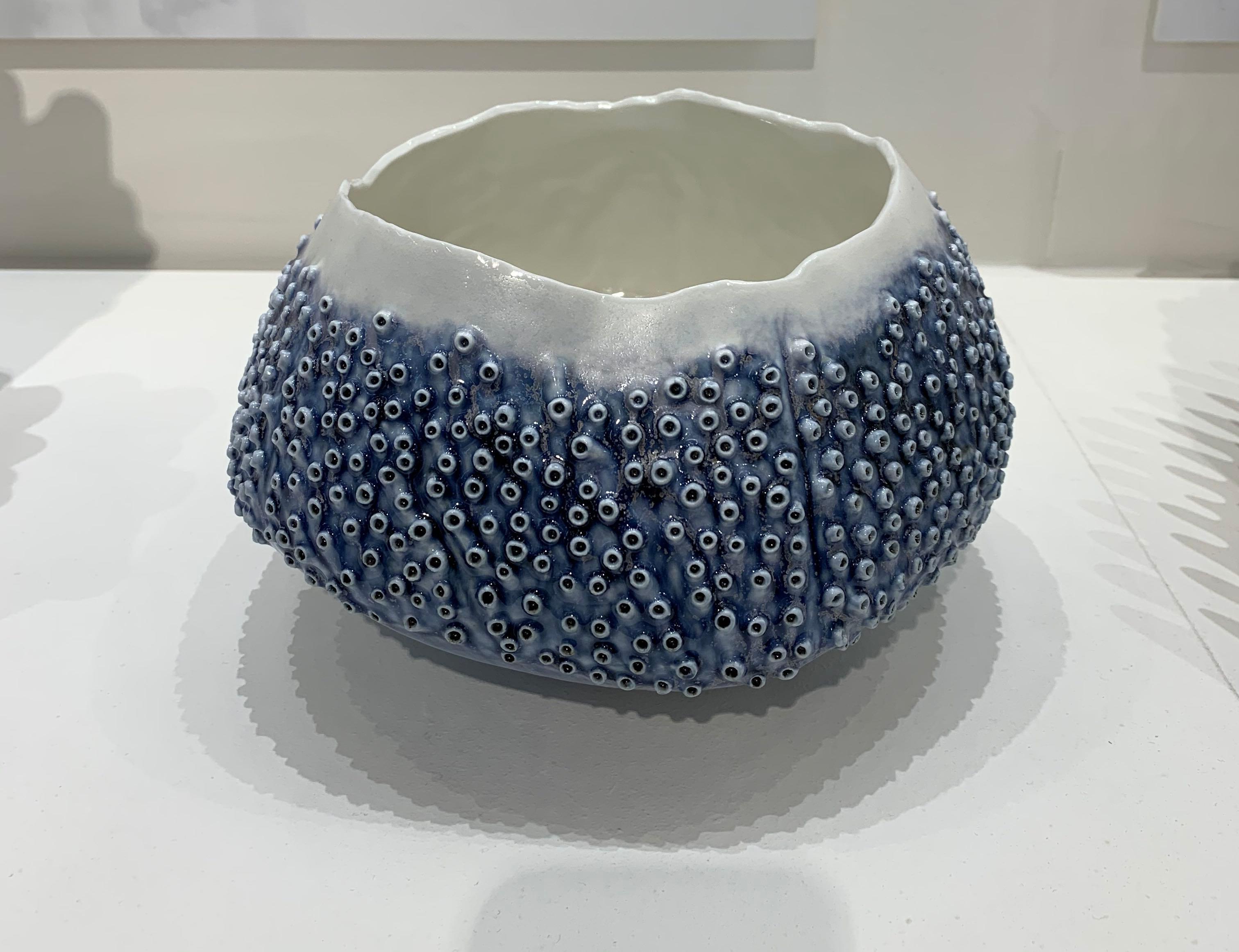 Contemporary Italian handmade porcelain bowl
Design inspired by sea coral
White bottom glaze with ocean blue color 