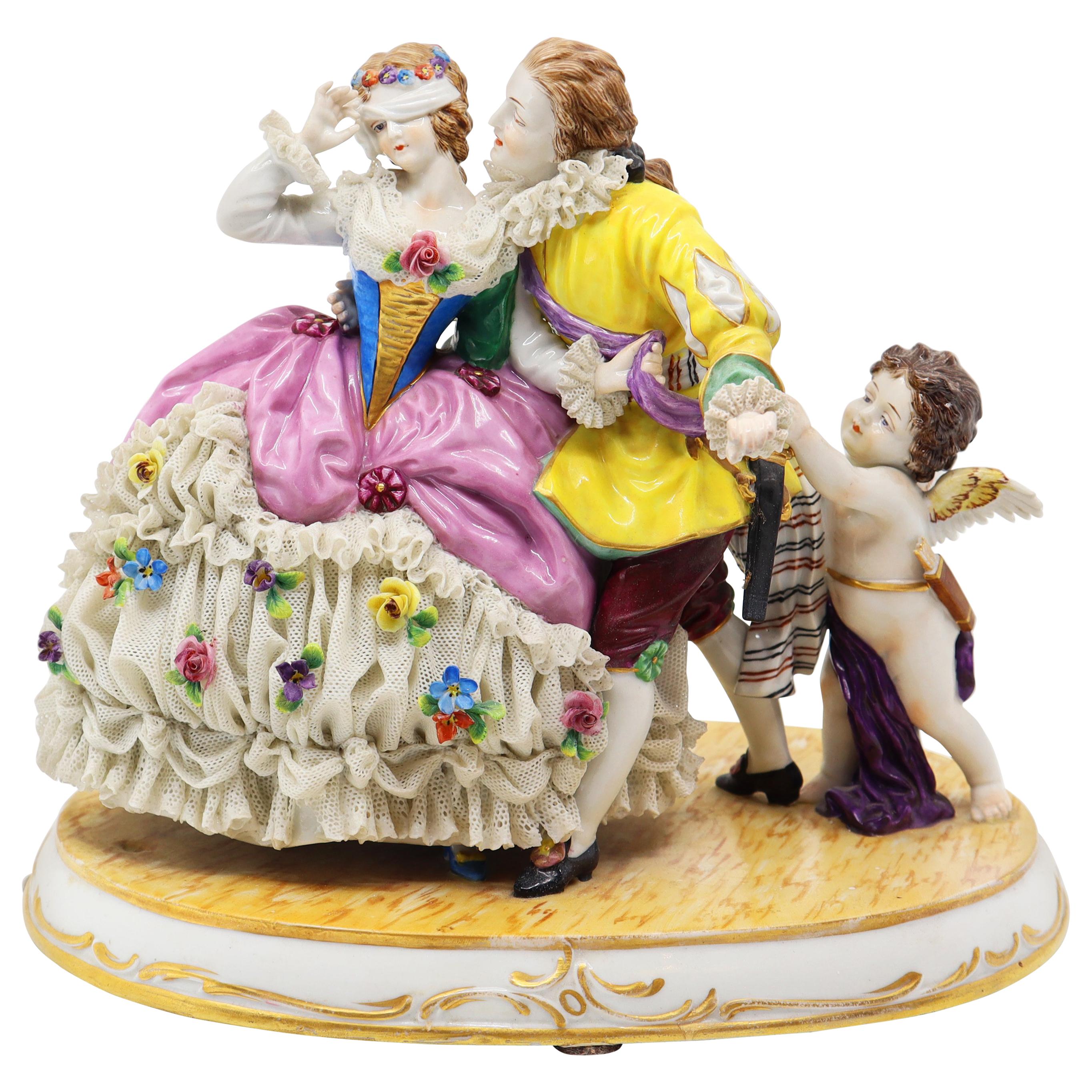 Porcelain Couple with Cherub Playing Hide and Seek