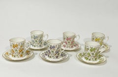 Porcelain cups and saucers by English Royal Albert "Rose Chintz" series, 1982