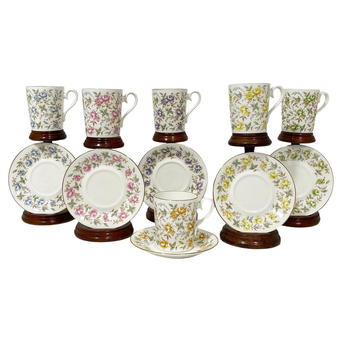Porcelain cups and saucers by English Royal Albert "Rose Chintz" series, 1982