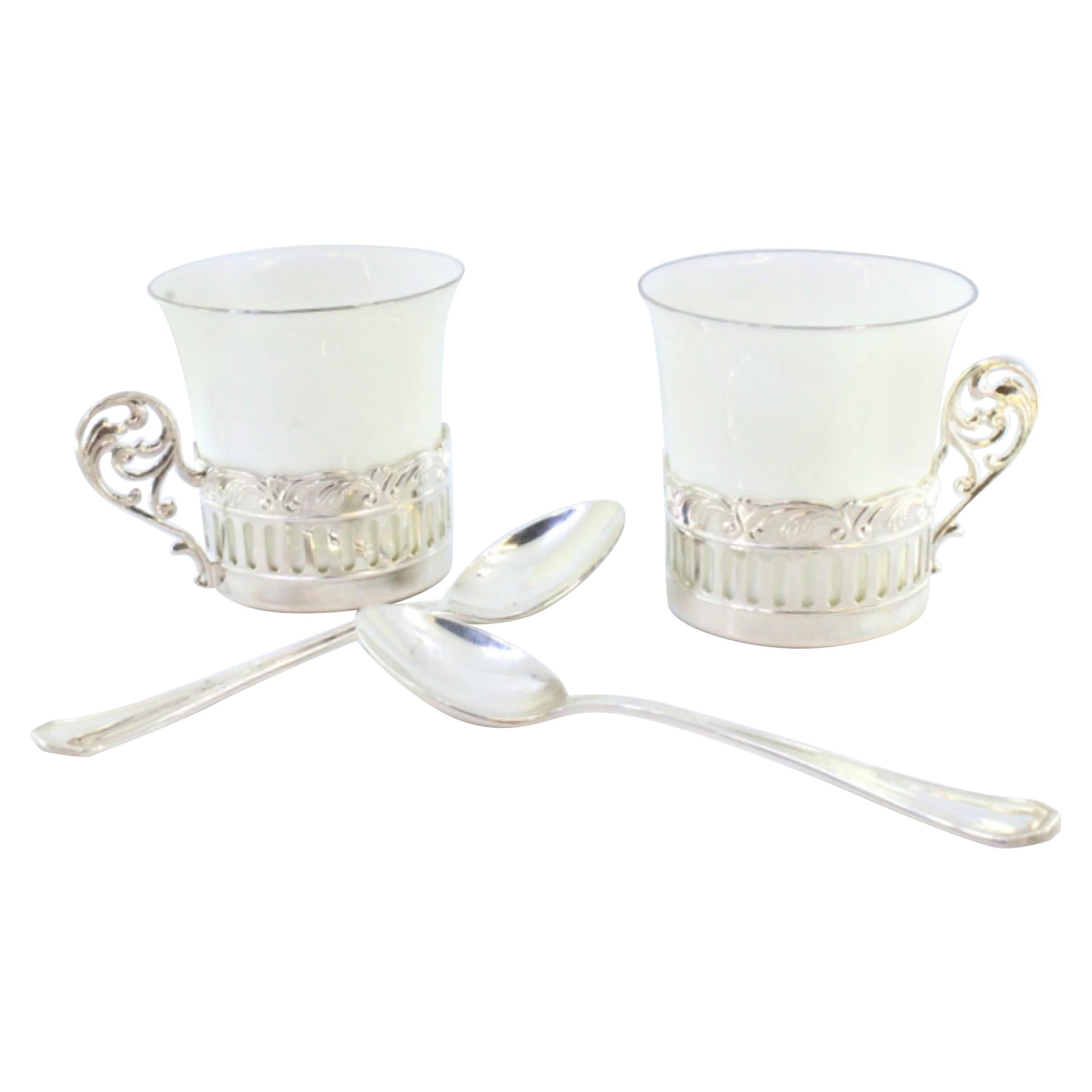 Porcelain cups with silver stands and two coffee spoons with their own case For Sale
