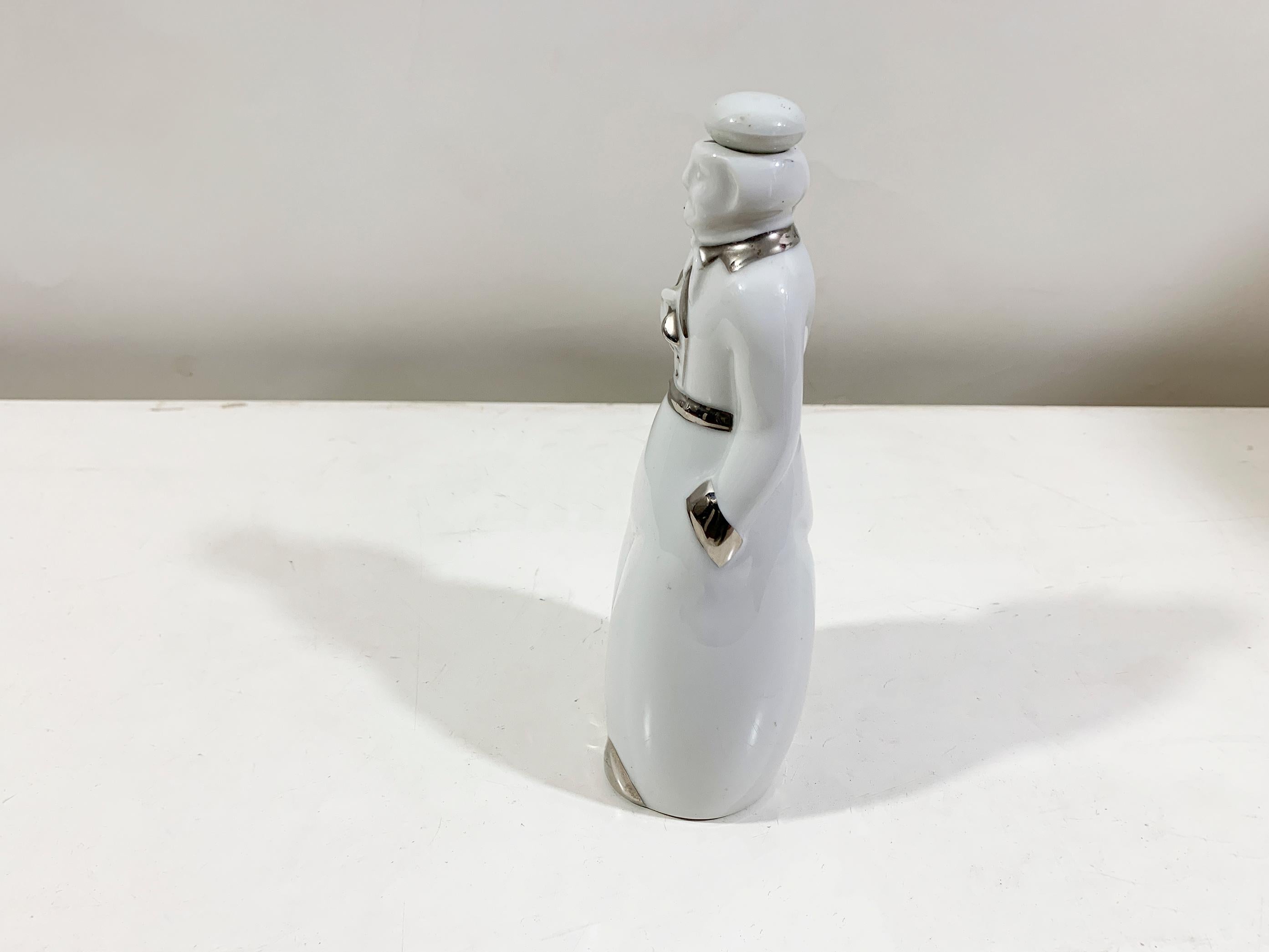 Porcelain Decanter Signed on the bottom 