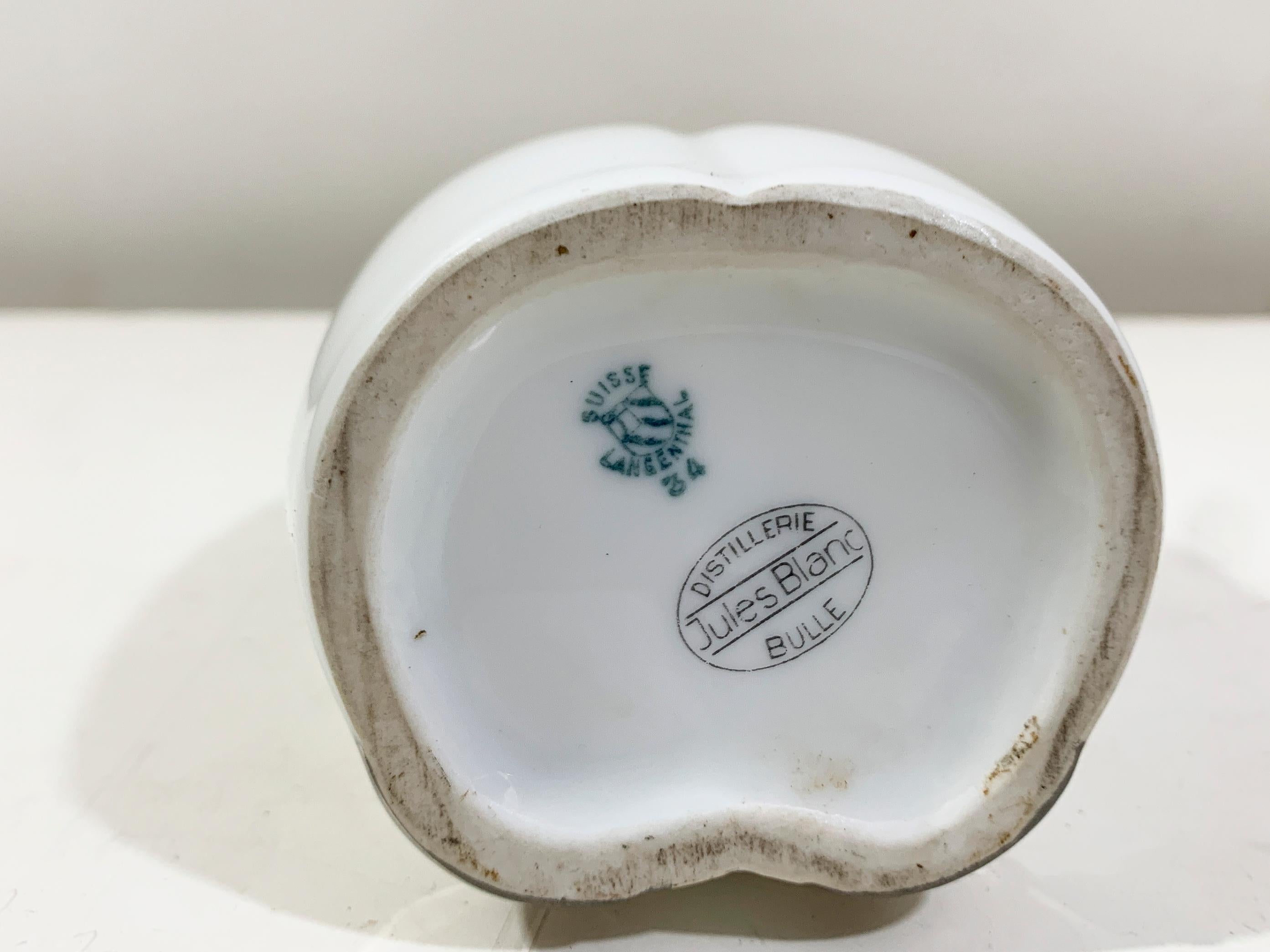 Porcelain Decanter Signed on the bottom 