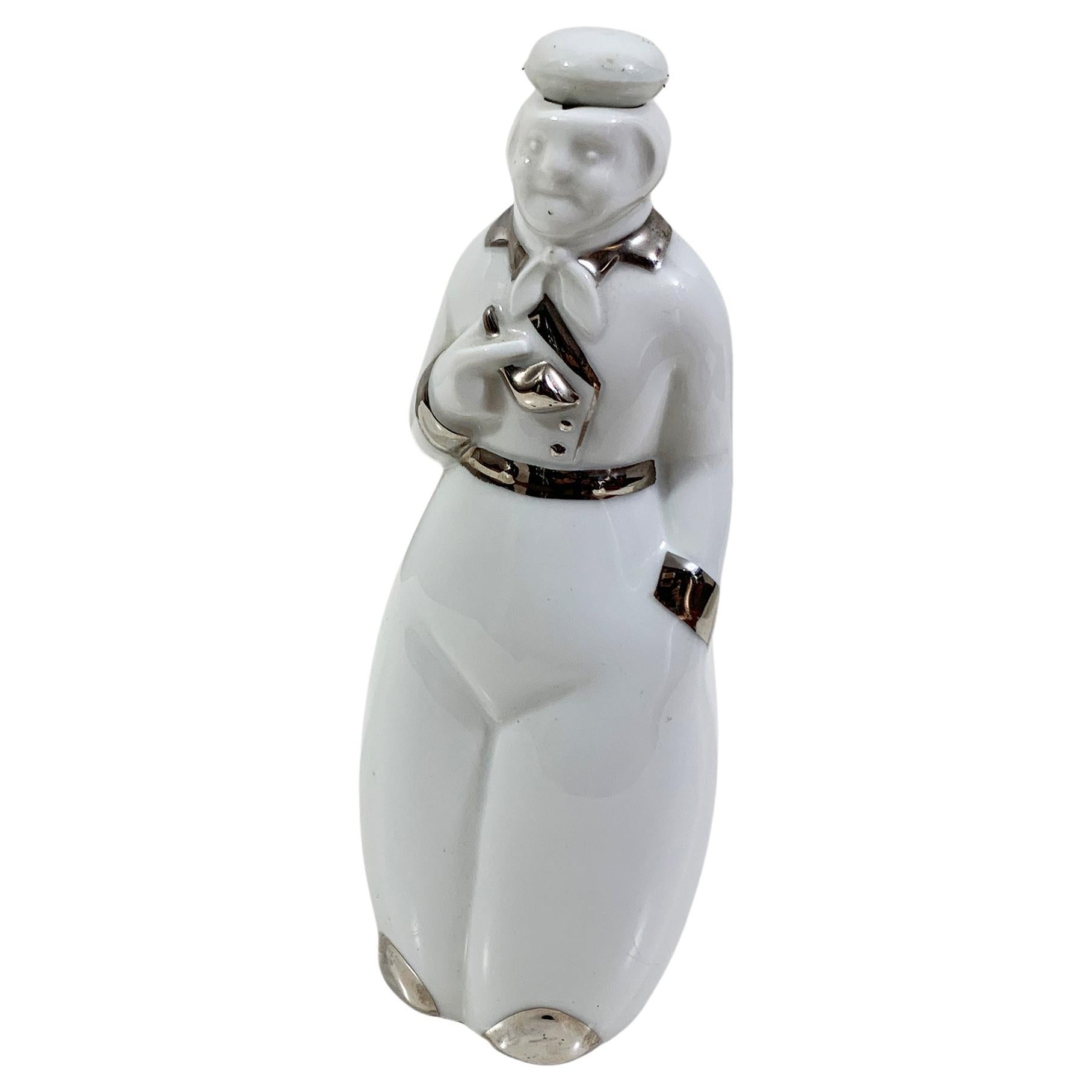 Decanter in porcellana firmato sul fondo "Jules Blanc Distillerie, Bulle".