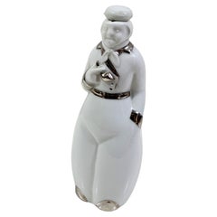 Decanter in porcellana firmato sul fondo "Jules Blanc Distillerie, Bulle".