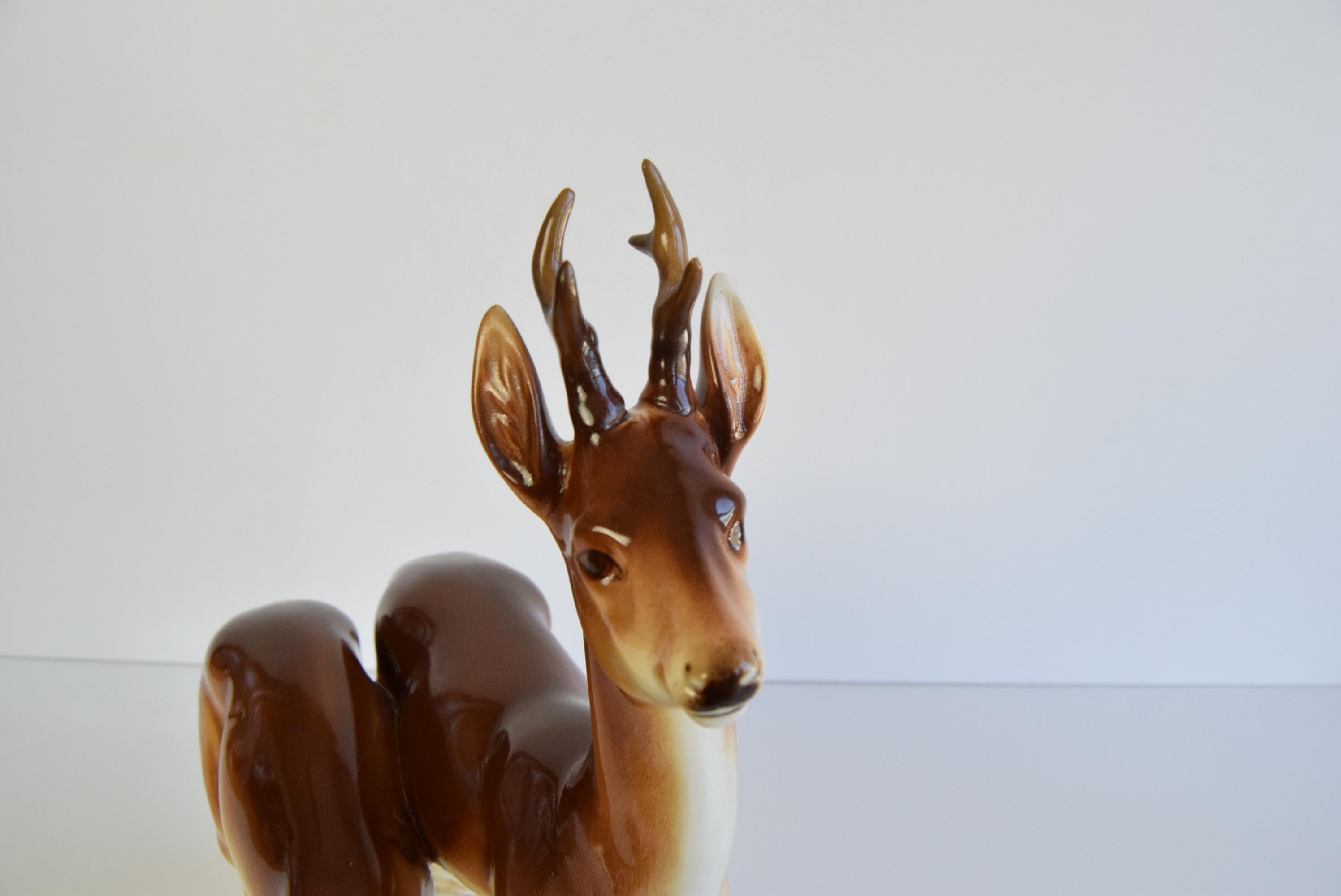 Porcelain Deer and Doe sculpture by Royal Dux, circa 1950's.  For Sale 4