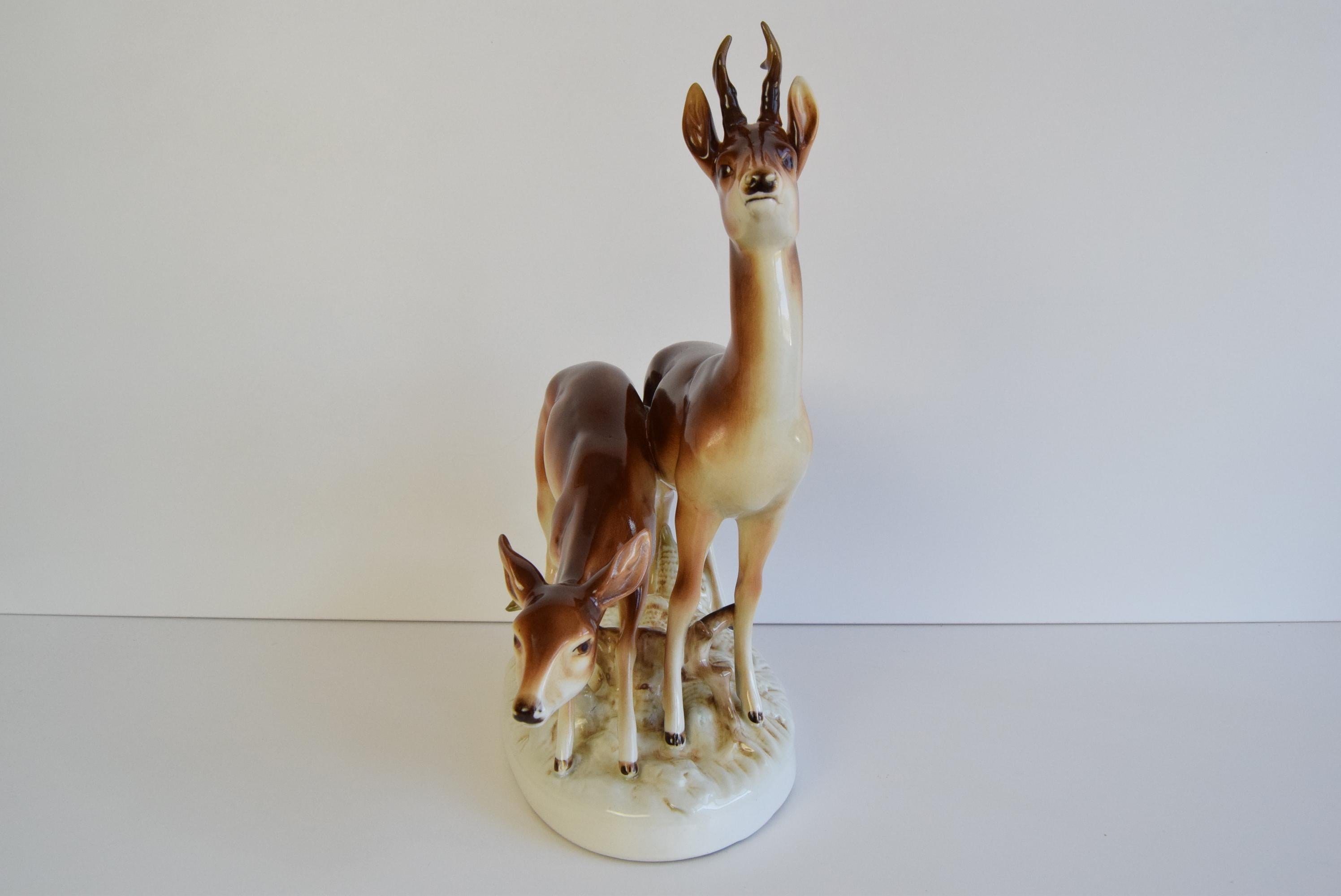 Czech Porcelain Deer and Doe sculpture by Royal Dux, circa 1950's.  For Sale