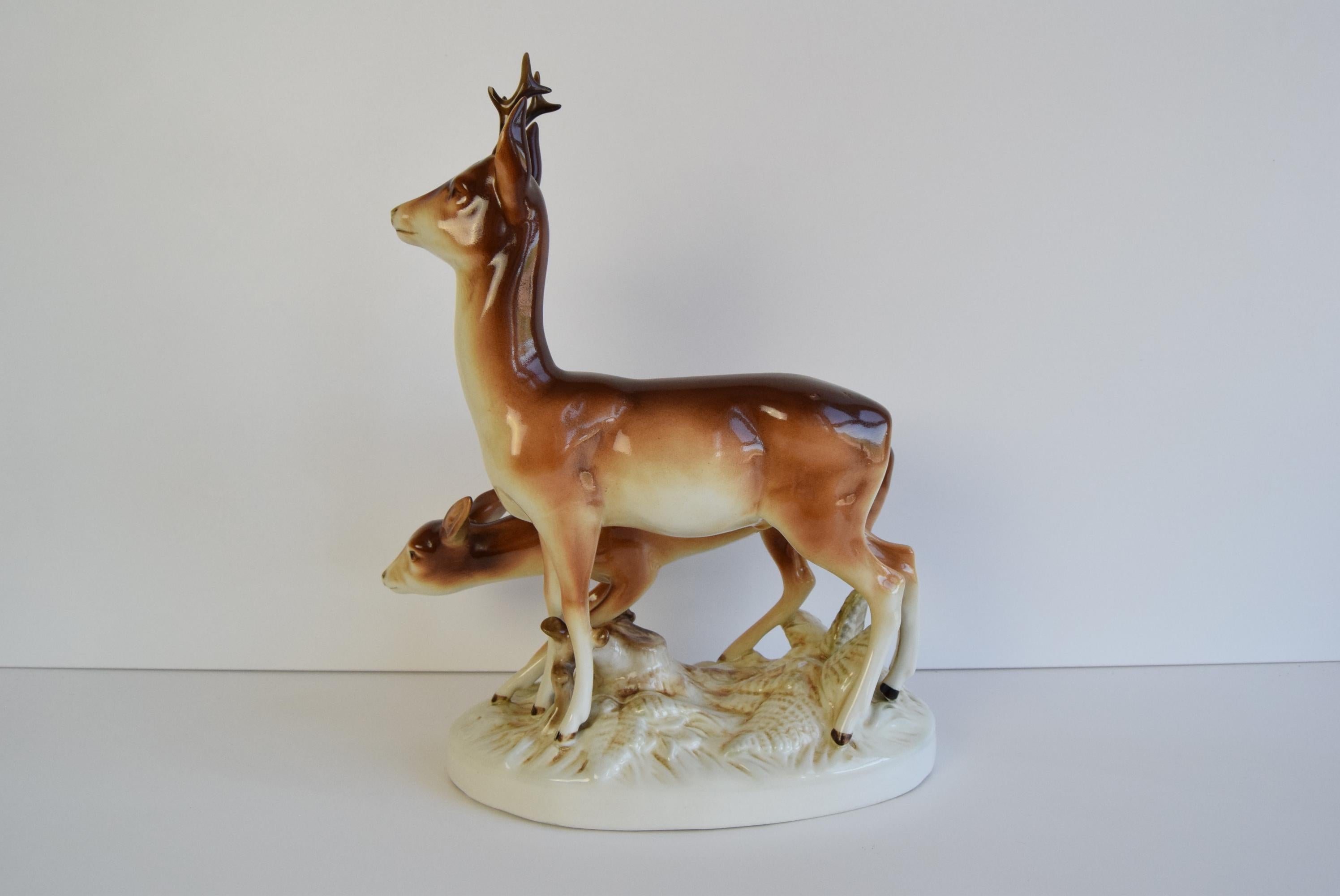 Porcelain Deer and Doe sculpture by Royal Dux, circa 1950's.  In Good Condition For Sale In Praha, CZ
