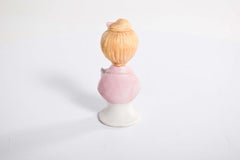 Porcelain Doll, Japan, With a Cat on Her Lap