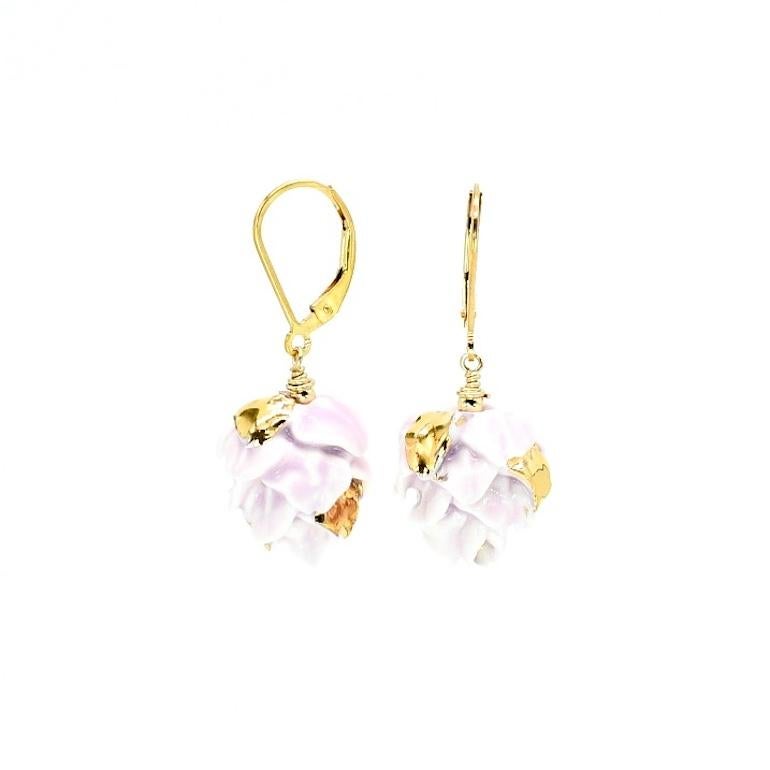 Porcelain  24K gold  Handmade in London

Introducing CASSIA Porcelain Ceramic Earrings. Crafted with the finest porcelain, each piece is a one-of-a-kind work of art. Delicate petals are assembled by hand and glazed in a beautiful orchid hue. Adorned
