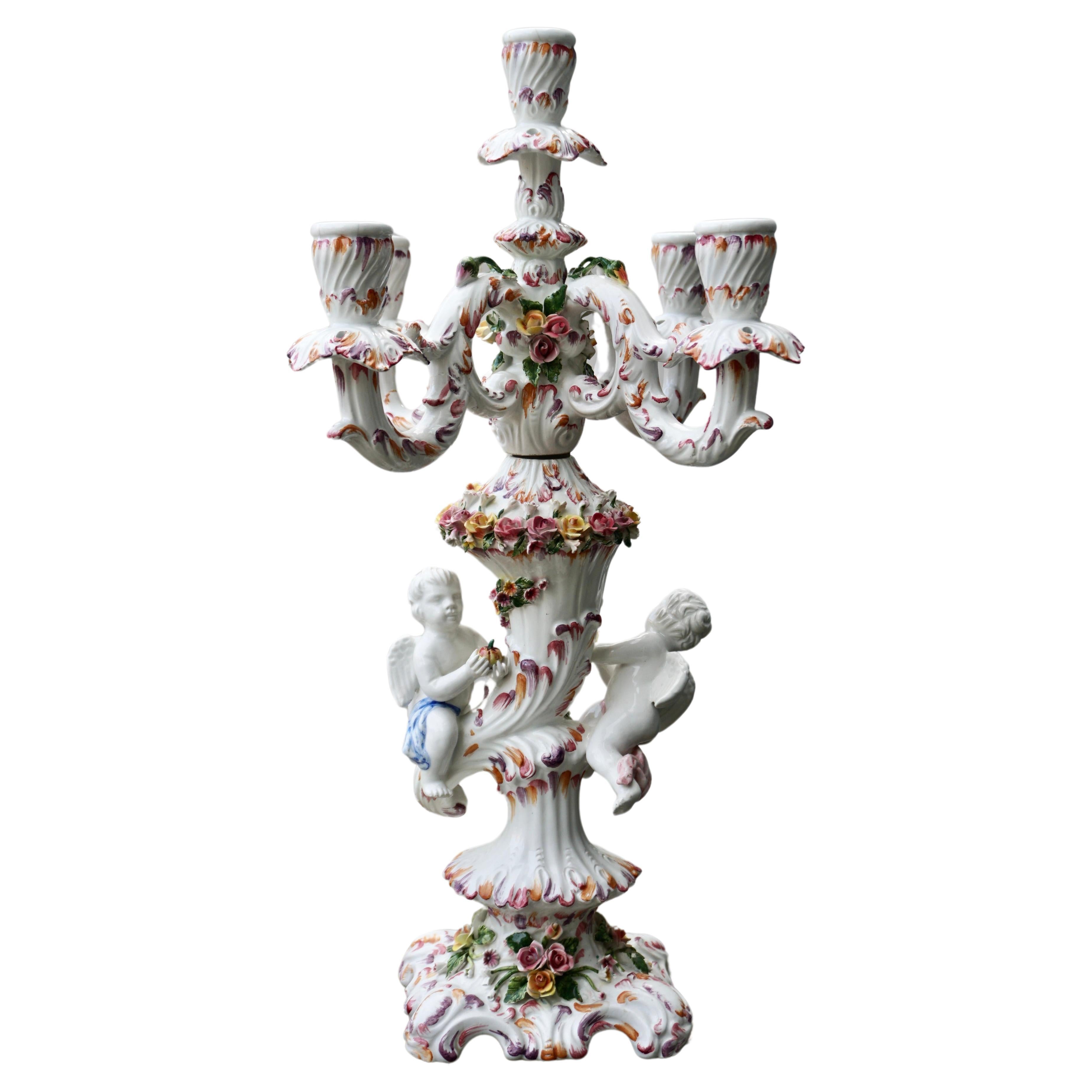 Porcelain Figural Cherub Floral Candelabra  For Sale