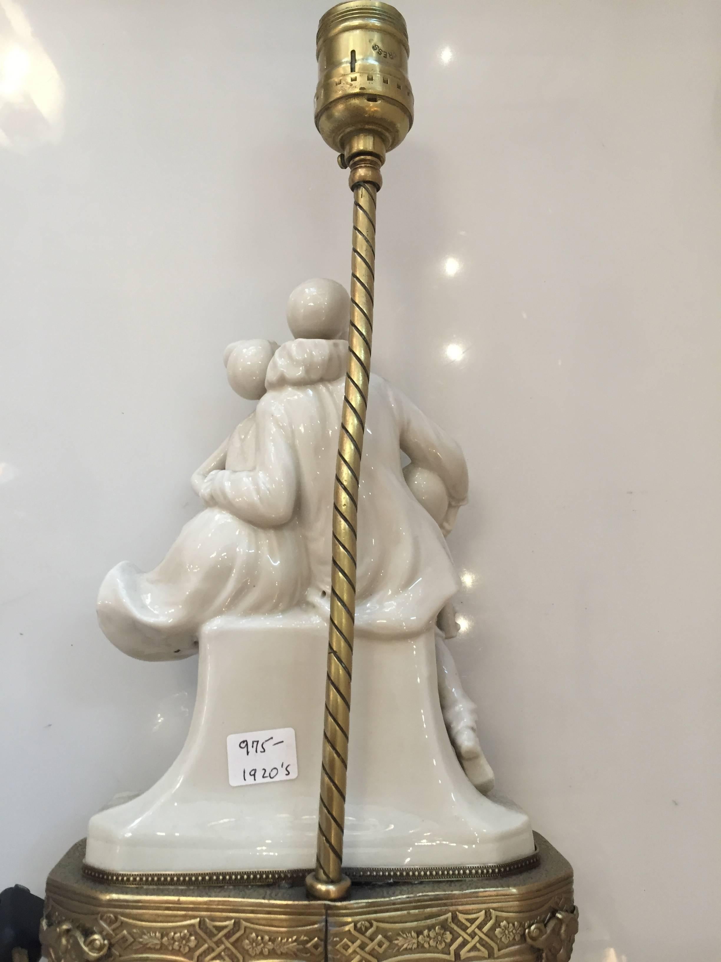 Art Deco Porcelain Figural Harlequin Lamp with Brass Base, circa 1920 For Sale