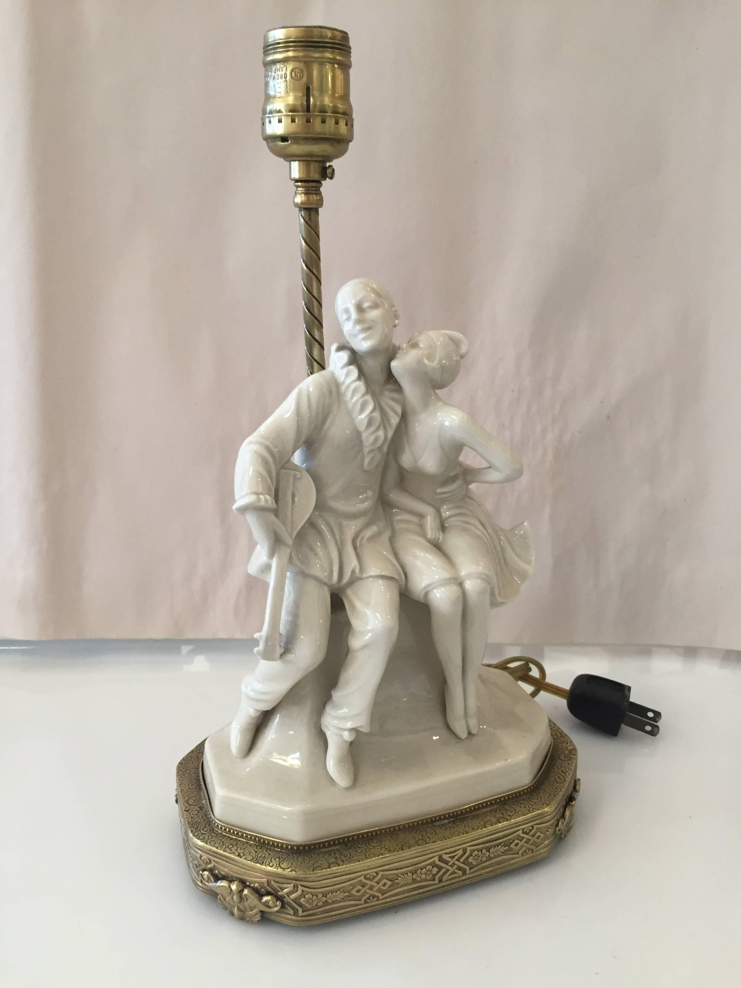 Early 20th Century Porcelain Figural Harlequin Lamp with Brass Base, circa 1920 For Sale