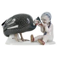 Porcelain figure "Child Feeding a Guinea Fowl", Goebel Wilhelmsfeld, Germany