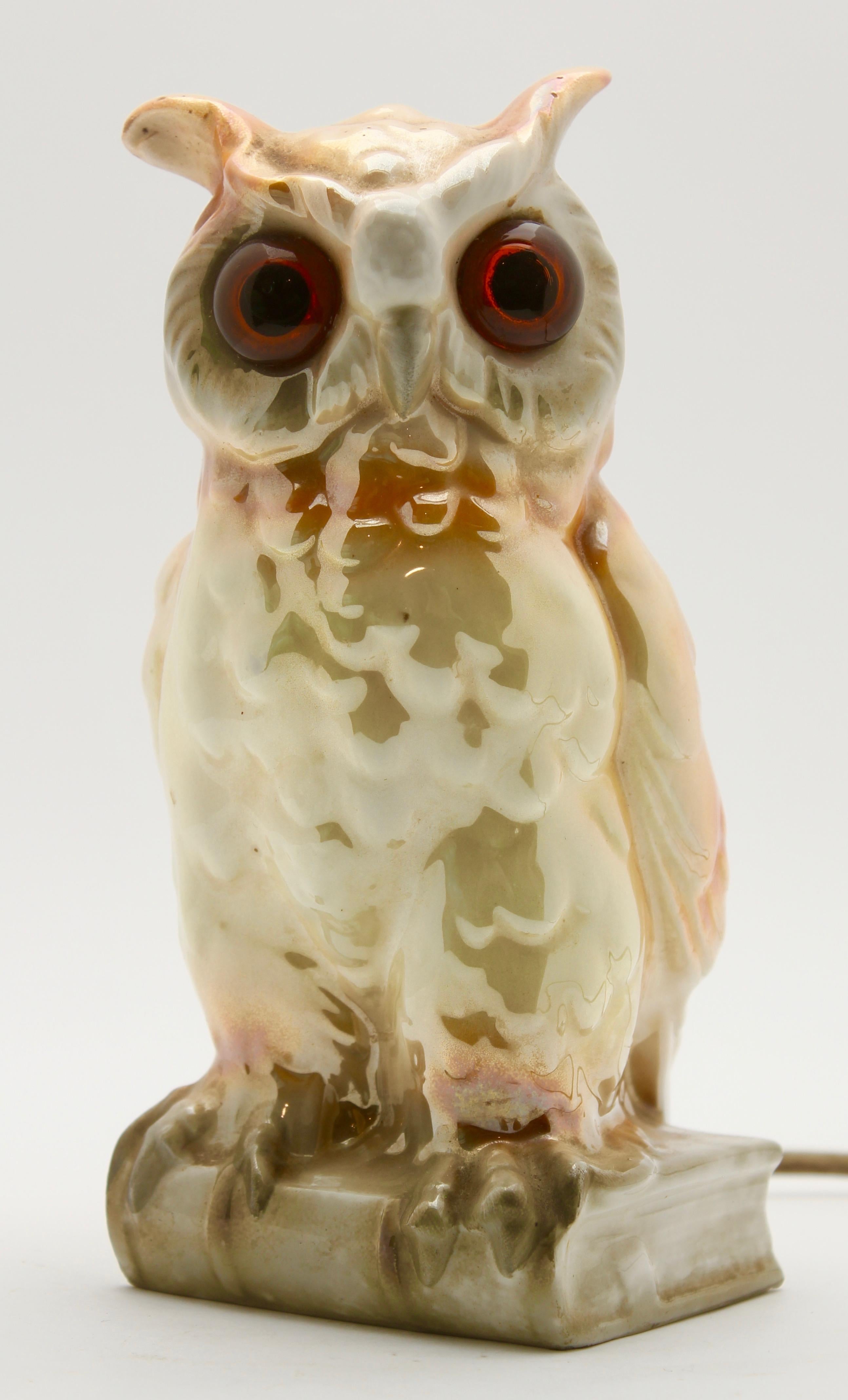 Germany, 1930s, excellent condition
Porcelain figurine / air purifier / table lamp. Owl. Undamaged original condition. The lighting works. A small container on the back can be filled with fragrance oil. The oil evaporates due to the heat of the
