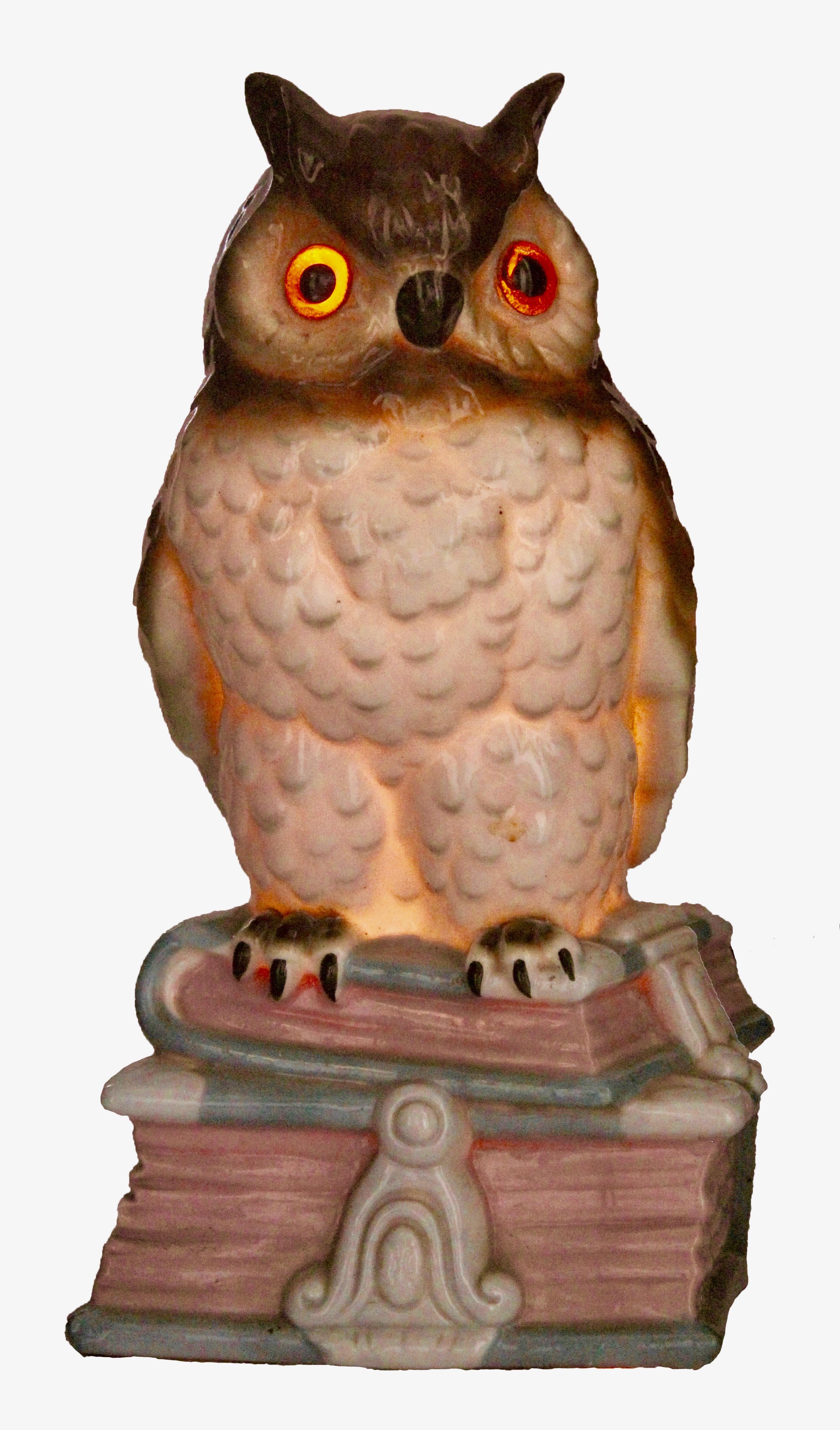 Germany, 1930s, excellent condition
Porcelain figurine/air purifier/table lamp. Owl eagle owl. Undamaged original condition. The lighting works. A small container on the back can be filled with fragrance oil. The oil evaporates due to the heat of