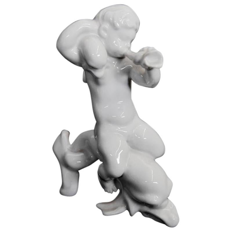 Bing & Grøndahl figurine en porcelaine, garçon sur le dauphin