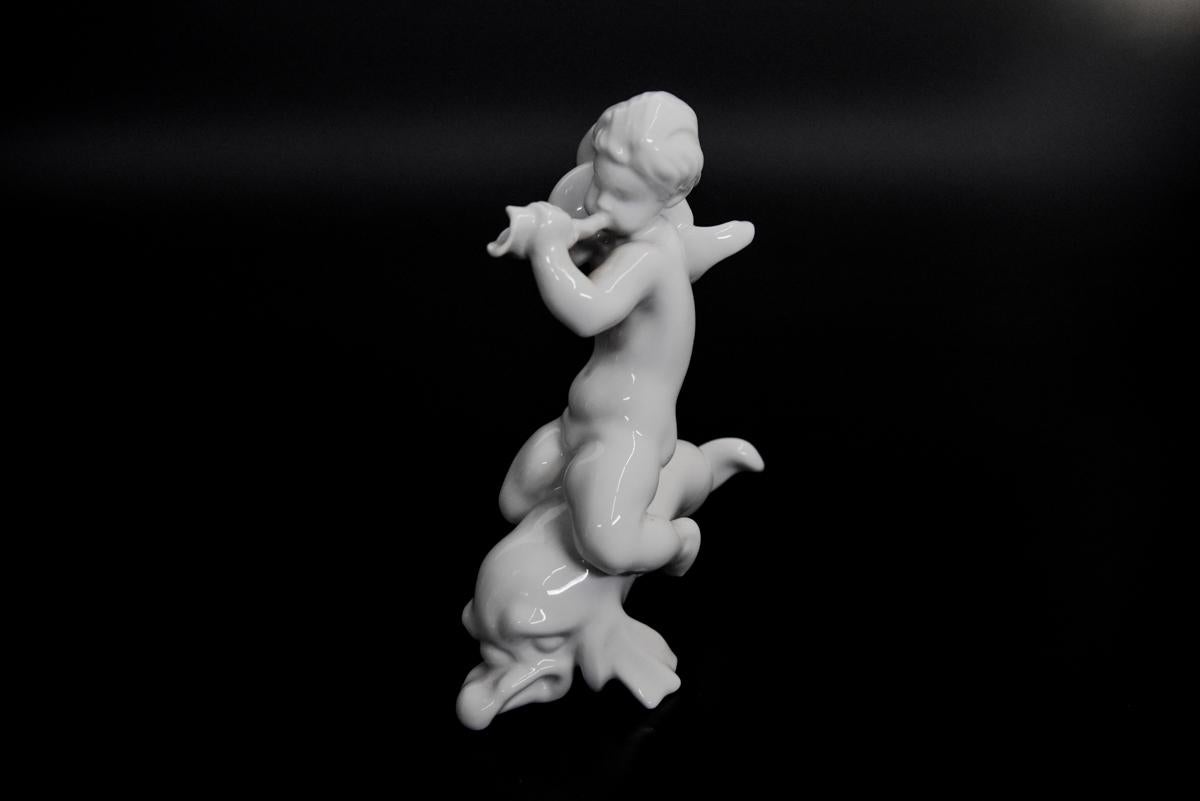 Porcelain figurine of the Danish Bing & Grøndahl manufactory,

Figurine in perfect condition. No. 59, boy on the dolphin.