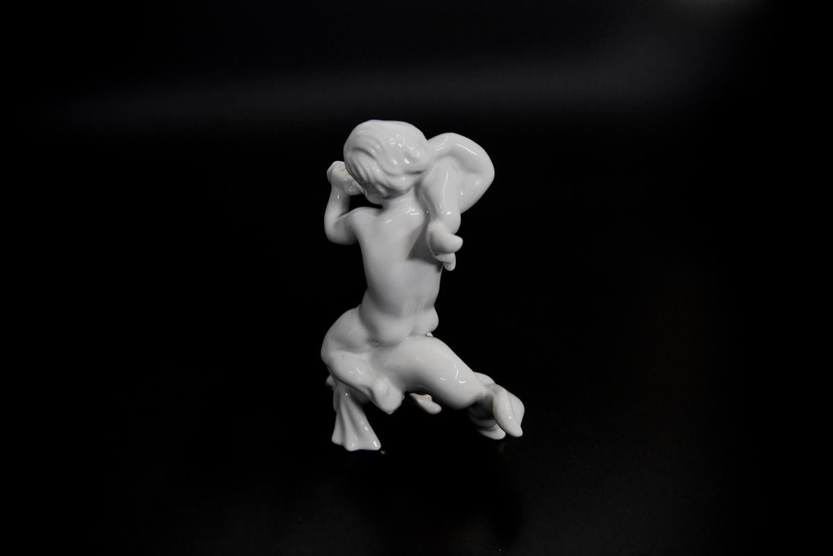 Danois Bing & Grøndahl figurine en porcelaine, garçon sur le dauphin en vente