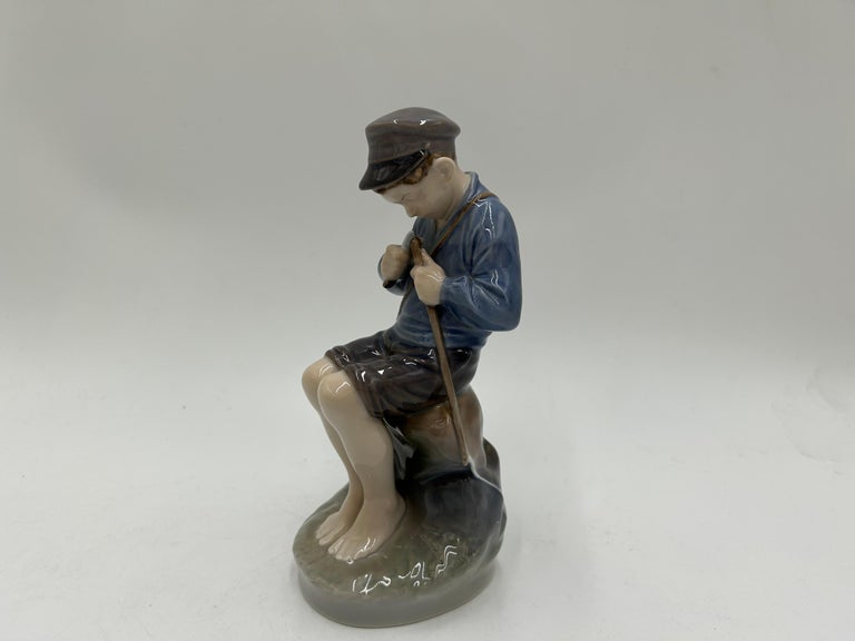 Porcelain Figurine "Boy Whittling a Stick", Royal Copenhagen, Denmark