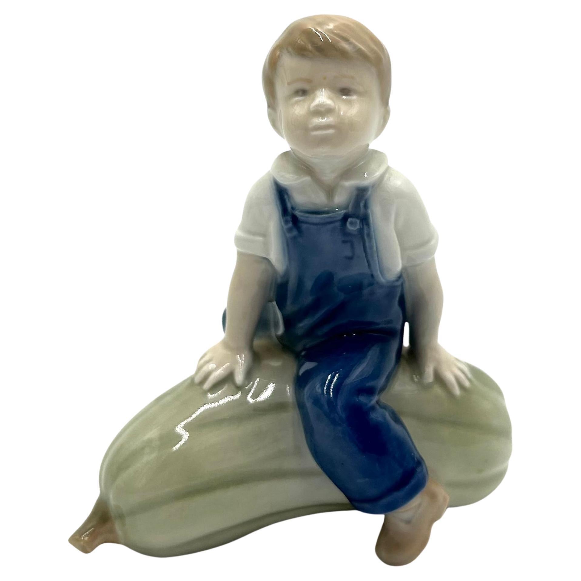 Set of Three Royal Copenhagen Porcelain Figurines "Boy Feeding Geese