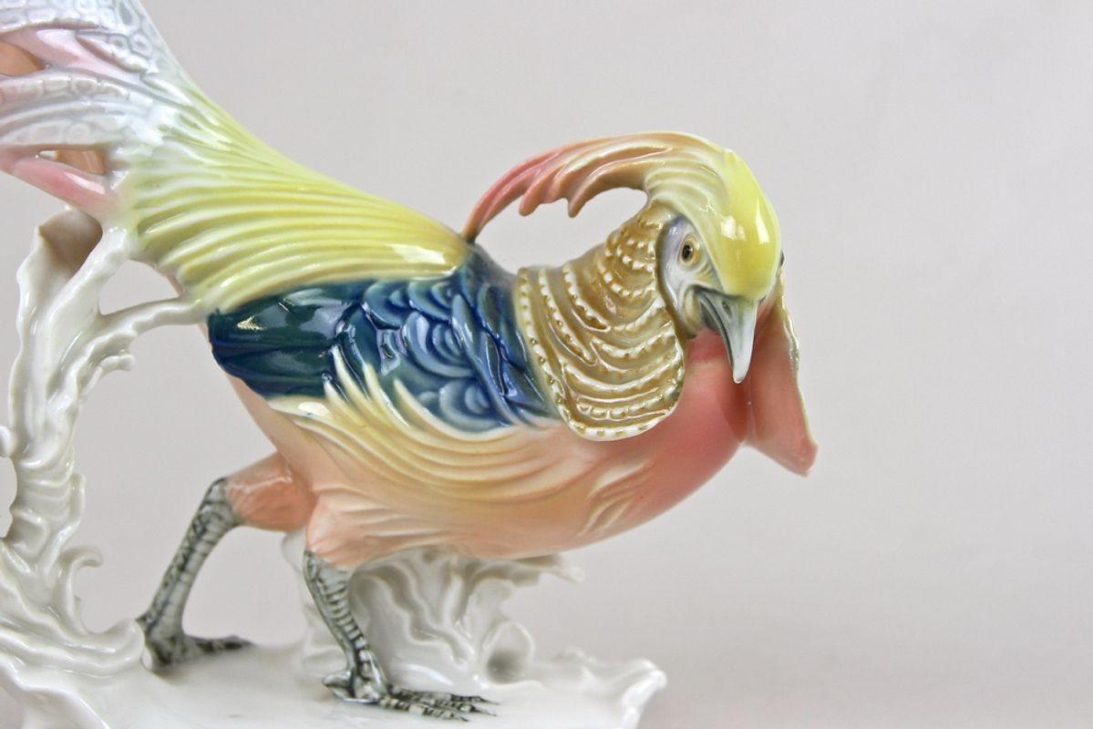 Lovely hand-painted golden pheasant porcelain figurine from the famous company of F. Karl Ens around 1920. Artfully crafted by one of the old manufactories for porcelain in Germany (founded in the middle of the 19th century in Thüringen) this