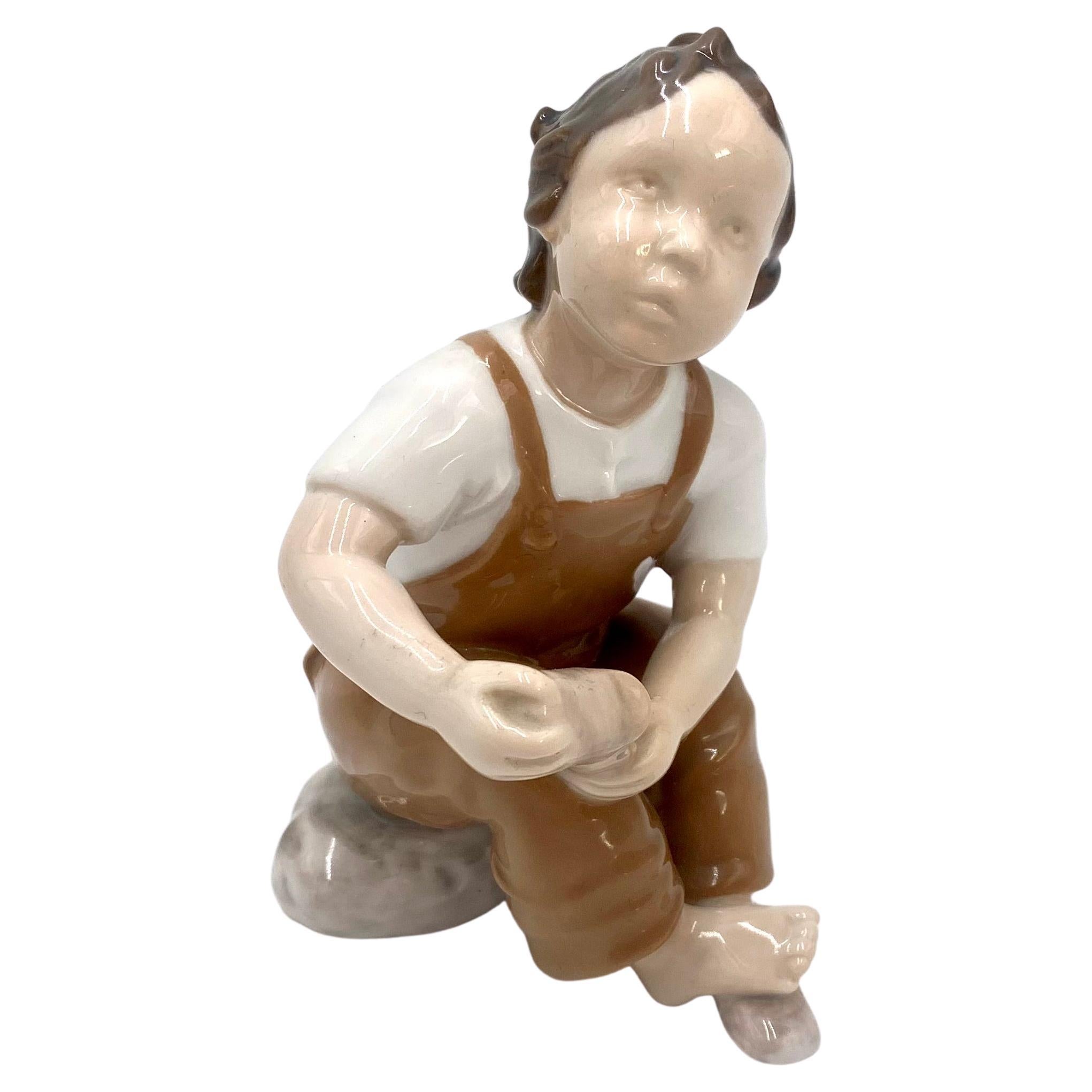 Porcelain Figurine of a Boy, Bing & Grondahl, Denmark, 1950s / 1960s For Sale