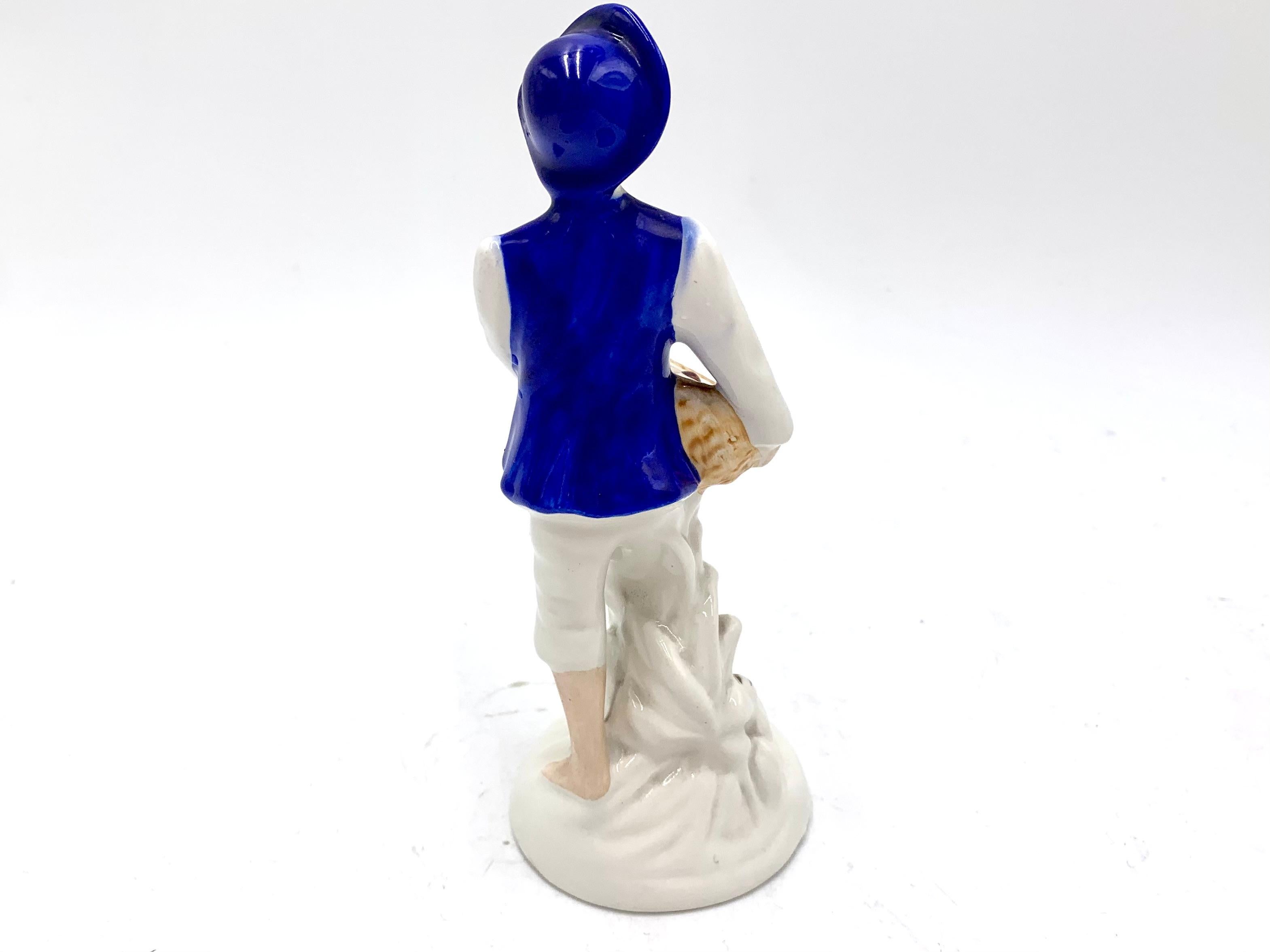 Porcelain Figurine of a Boy, Jan Jezela, 1970s and 1980s In Fair Condition For Sale In Chorzów, PL