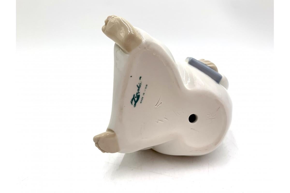 Spanish Porcelain figurine of a boy with a candle, Zahir Lladro, Spain, 1970s
