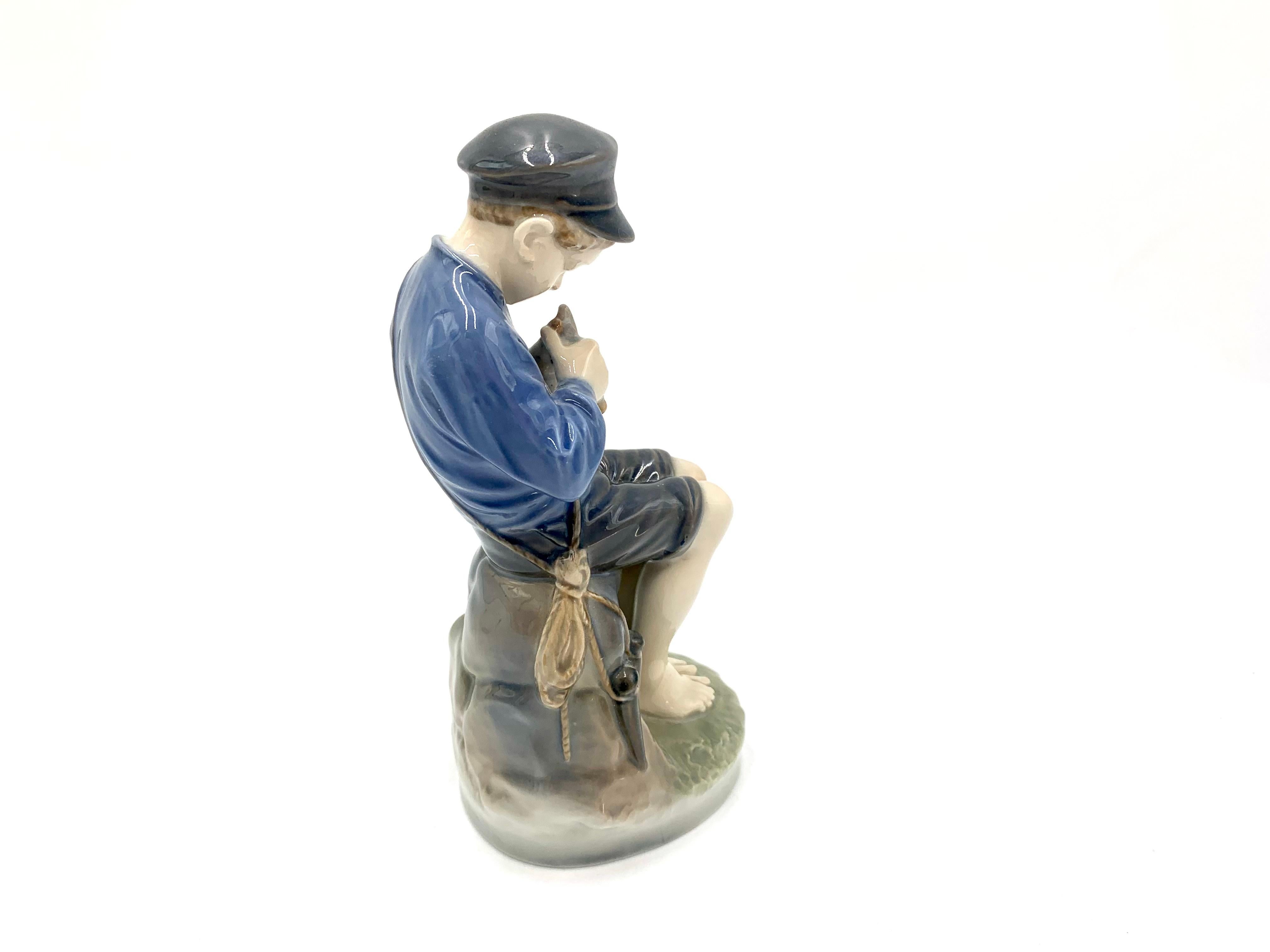 Danois Figurine en porcelaine représentant un garçon avec un Sticks, Royal Copenhagen, Danemark en vente