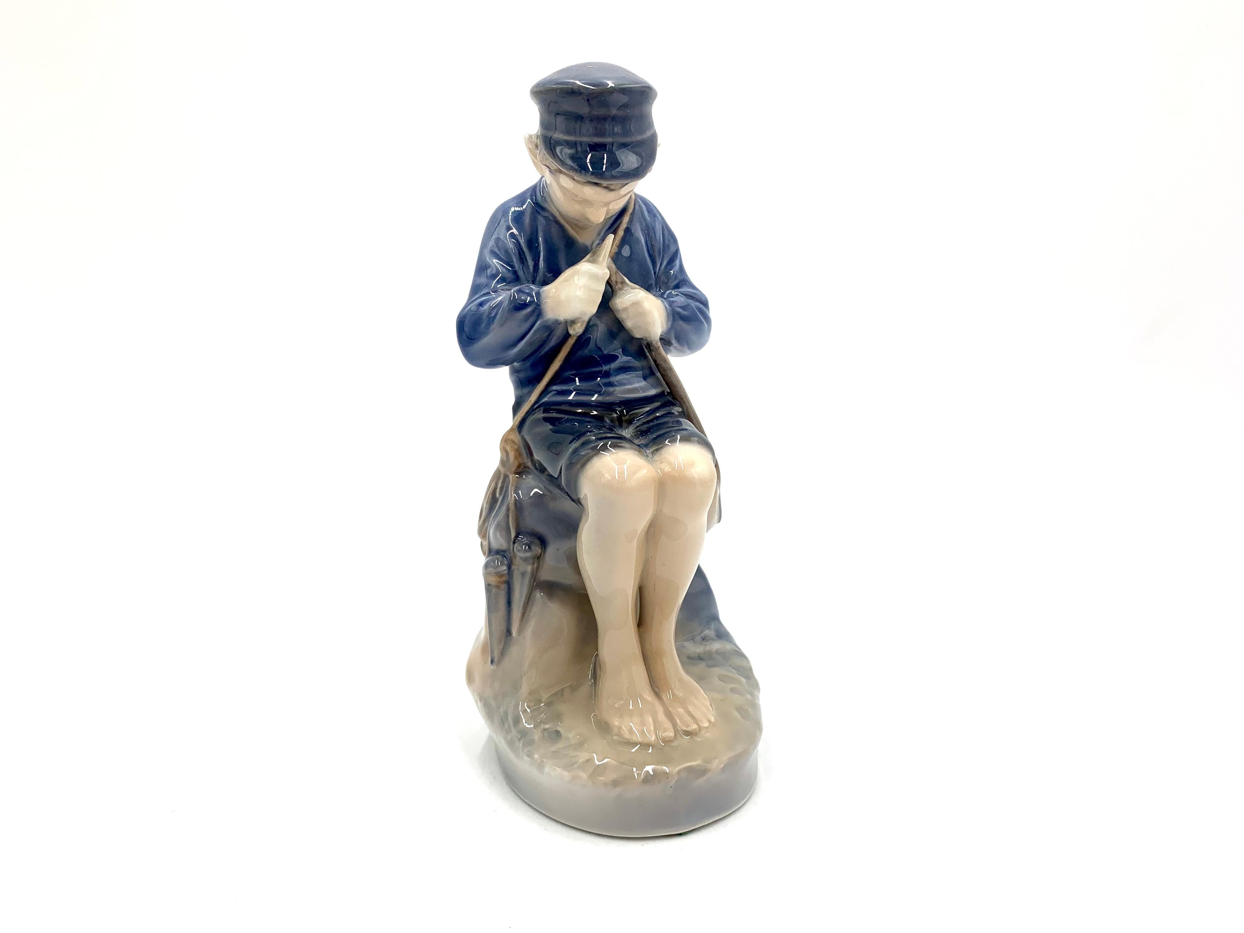 Danish Porcelain Figurine of a Boy with a Stick, Royal Copenhagen, Denmark For Sale