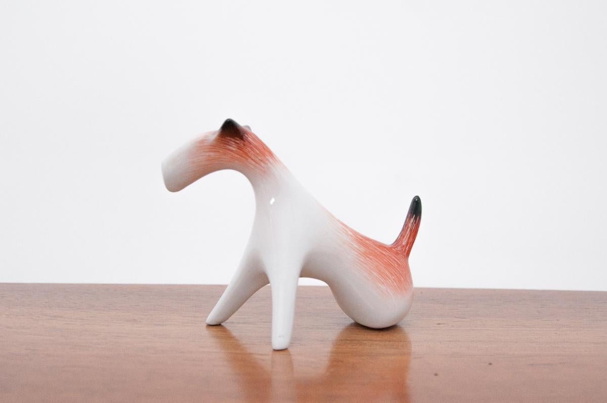 Porcelain figure of the Fox terrier

Figurine without damage

Signed: Cmielów

Model from 1965.

Designed by Mieczyslaw Naruszewicz.
