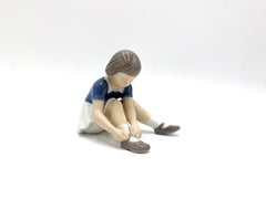 Porcelain Figurine of a Girl Lacing Her Shoes, Bing & Grondahl, Denmark, 1950s