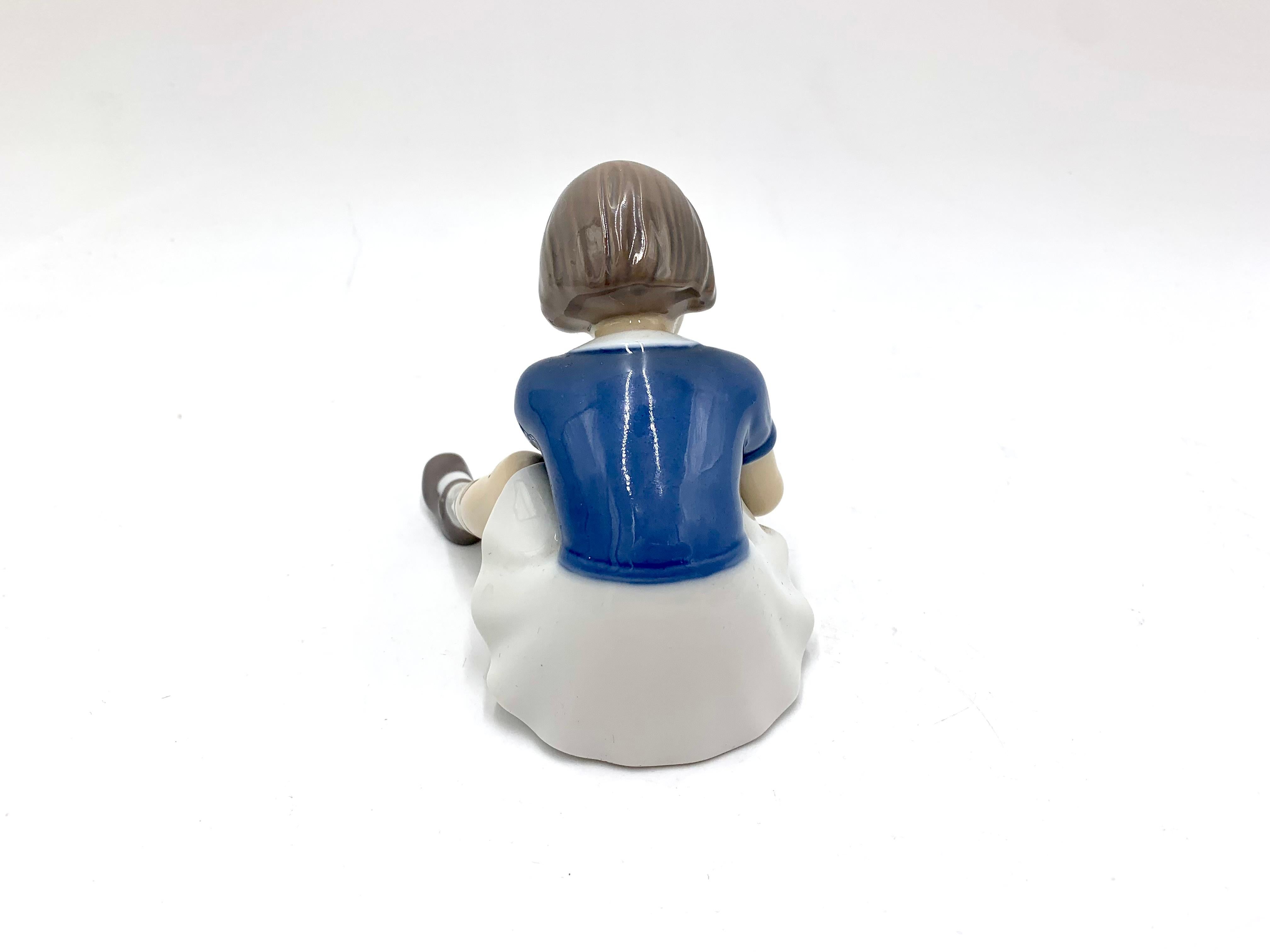 Mid-Century Modern Porcelain Figurine of a Girl Lacing Her Shoes, Bing & Grondahl, Denmark, 1950s