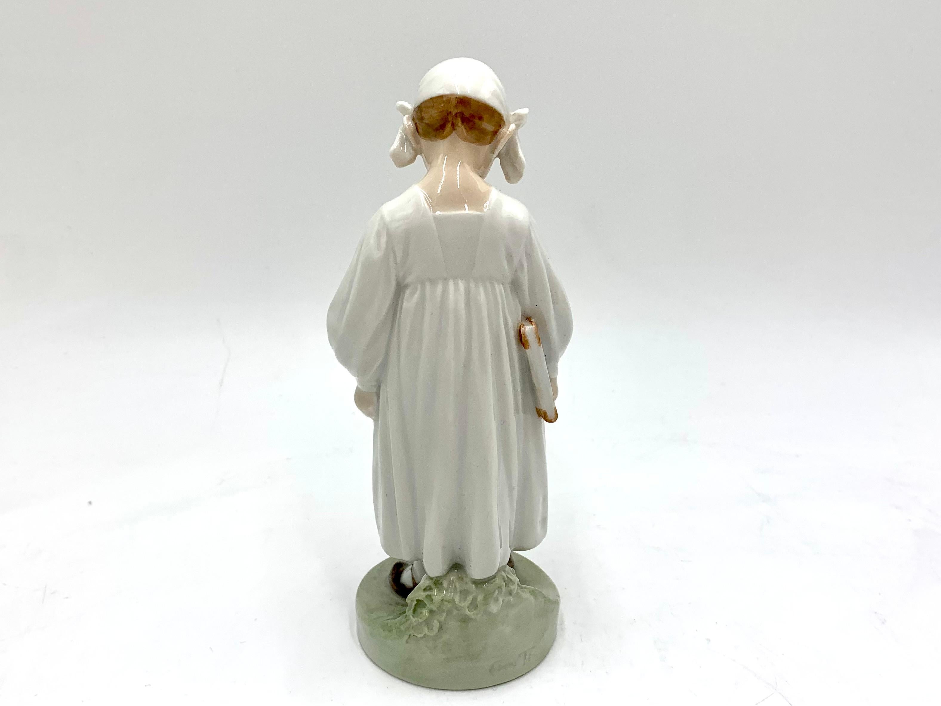 Danish Porcelain Figurine of a Girl with a Book, Royal Copenhagen, Denmark