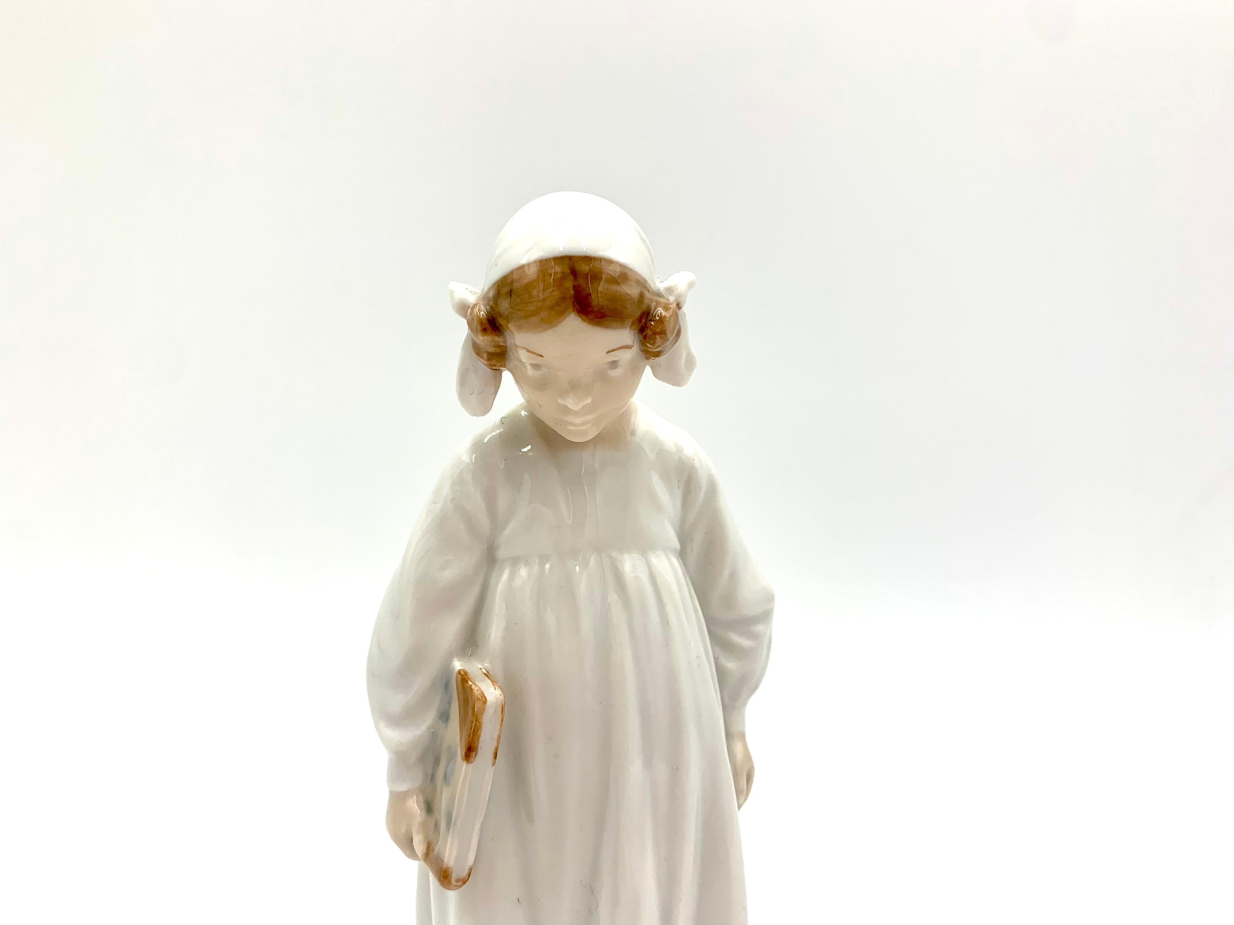 20th Century Porcelain Figurine of a Girl with a Book, Royal Copenhagen, Denmark