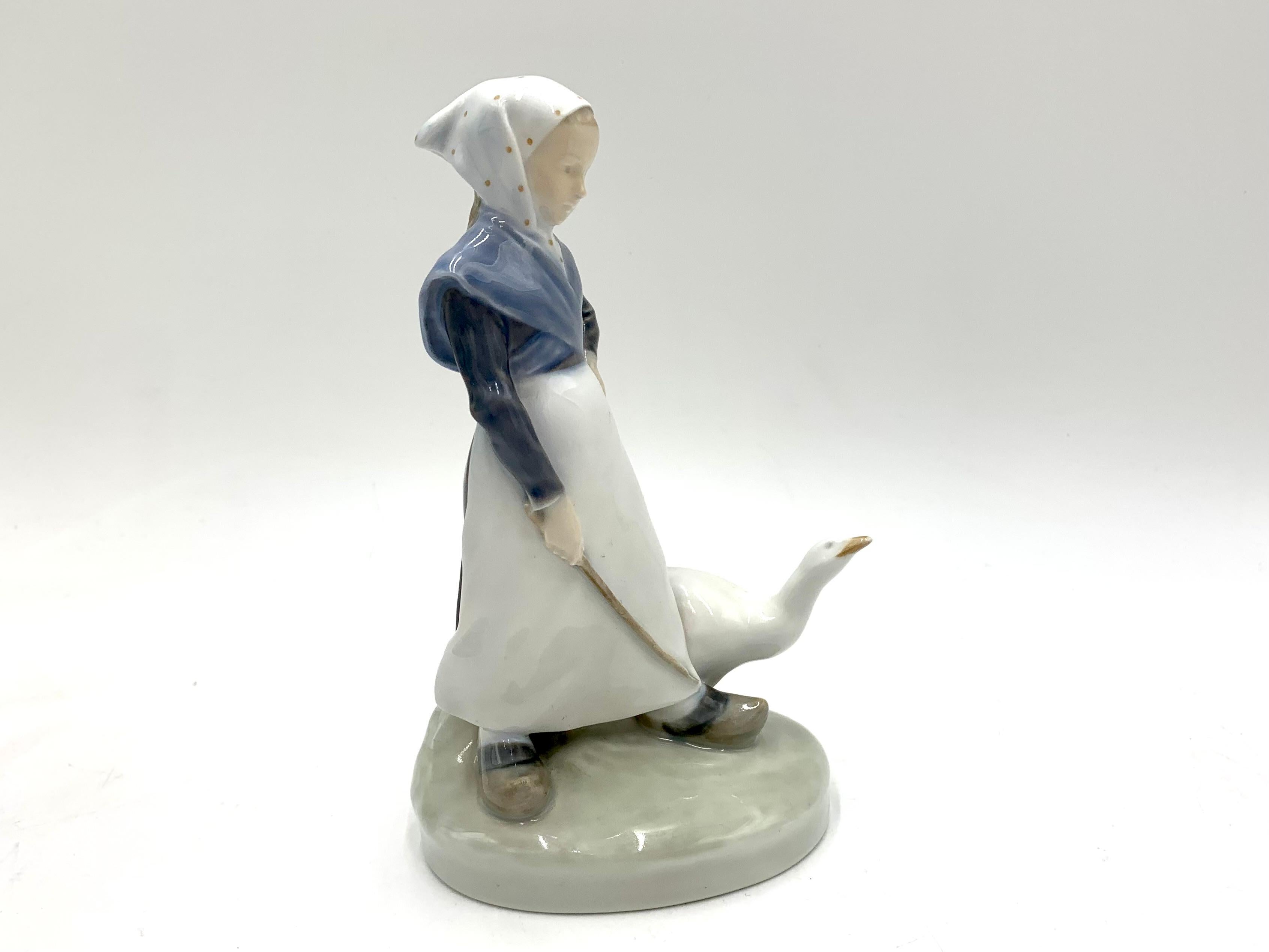 girl with goose figurine
