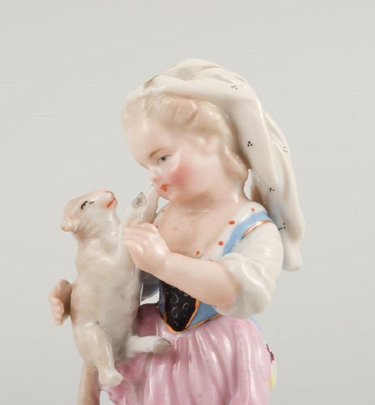 German Porcelain Figurine of a Girl with a Lamb, Late 19th C For Sale
