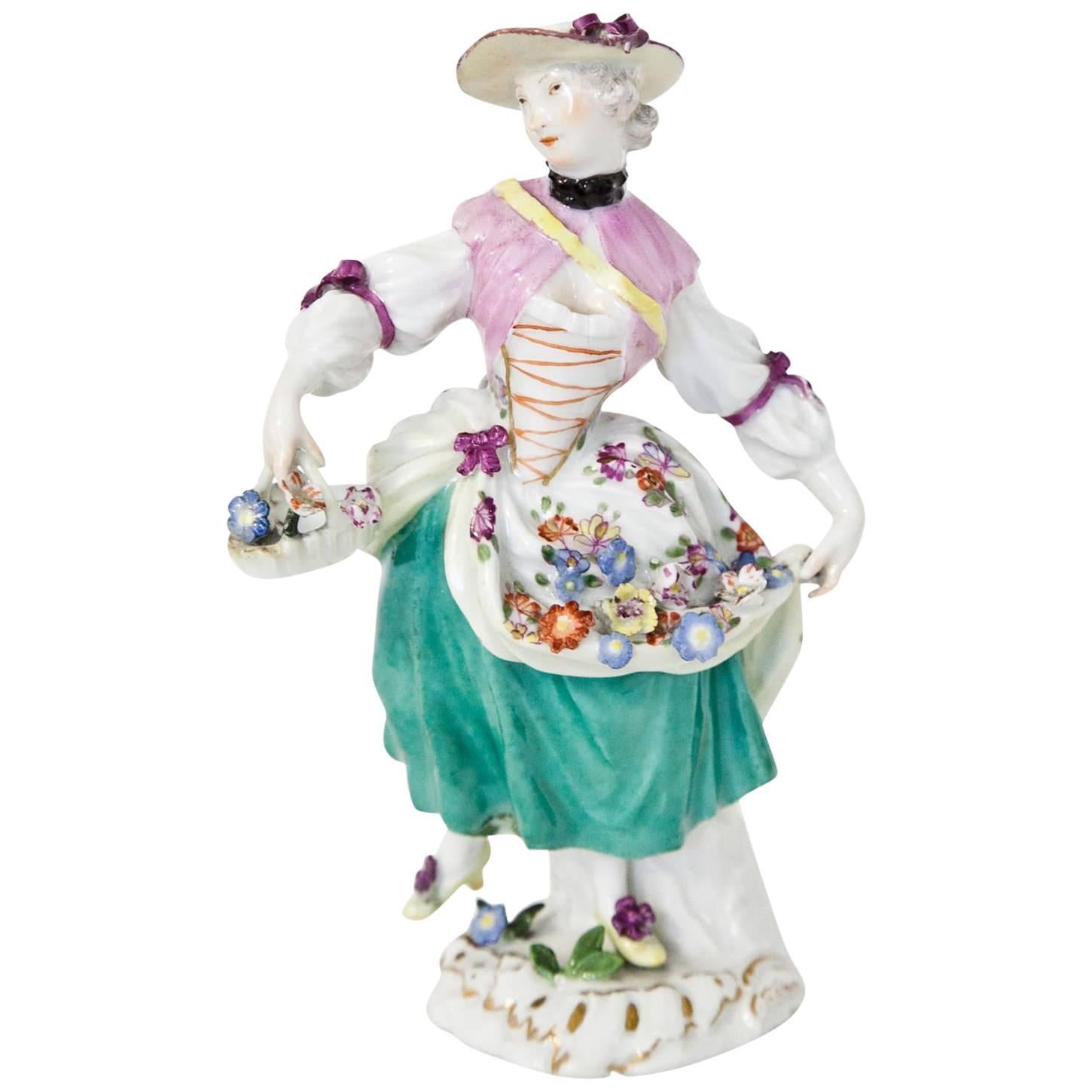 Porcelain Figurine of a Girl with Flowers after Kaendler, Meissen, circa 1750