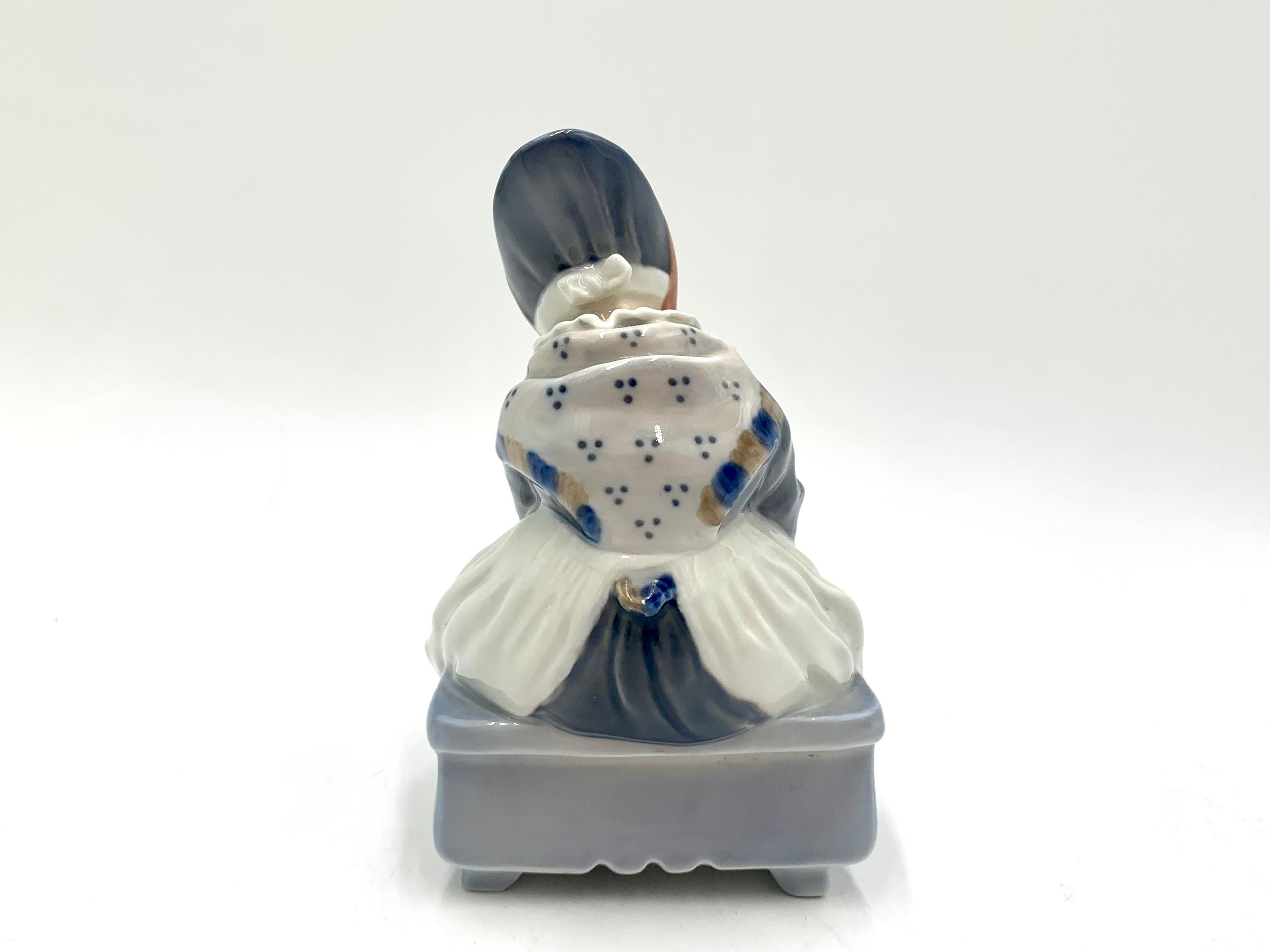 Mid-Century Modern Porcelain Figurine of a Sewing Woman, Royal Copenhagen, Denmark, 1970s For Sale