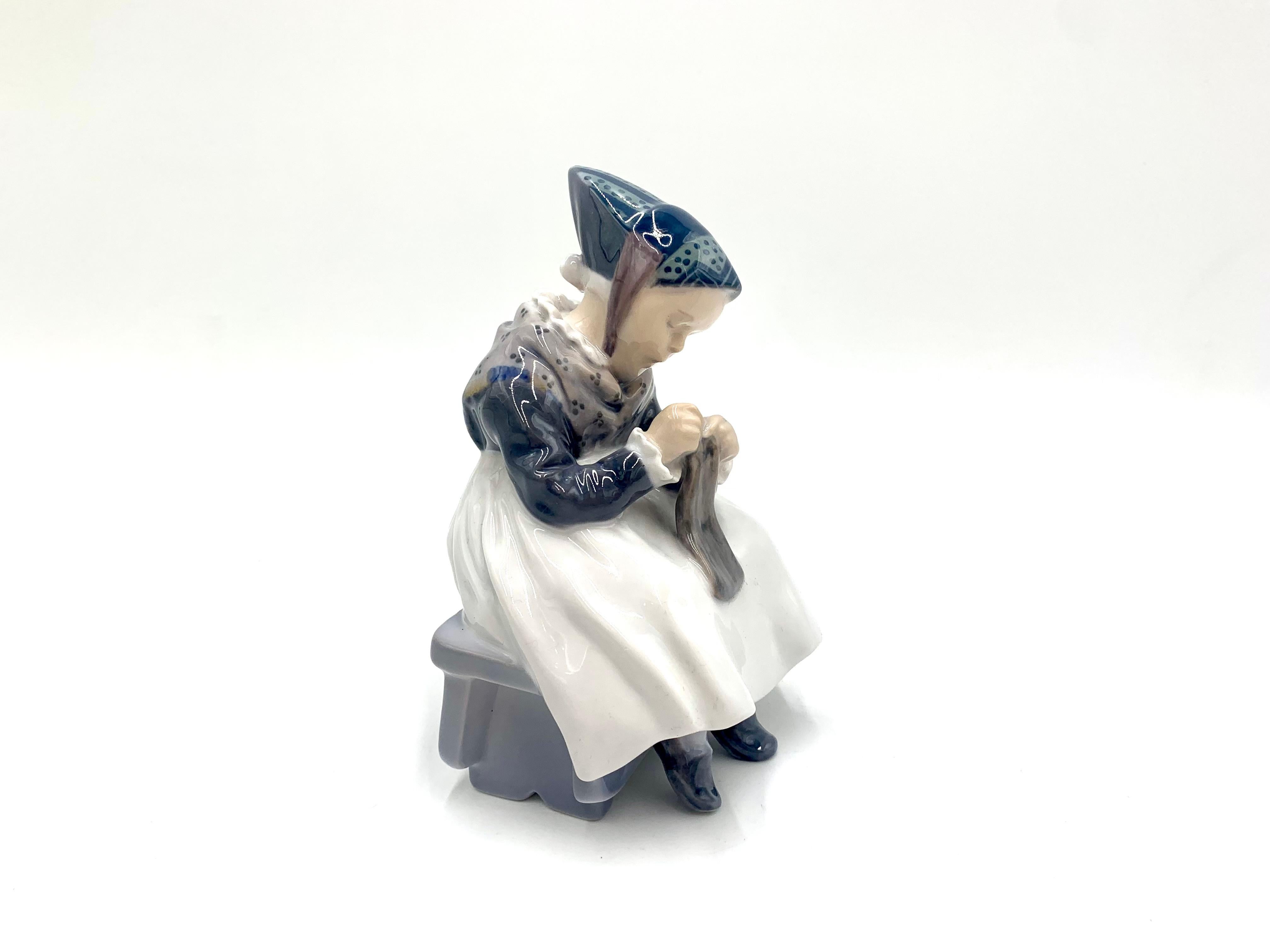 Porcelain figurine of a sewing woman in regional costume.

Made in Denmark by the Royal Copenhagen manufactory

Produced in 1957r.

Model number # 1314

Very good condition, no damage.

Measures: height 15cm, width 10cm, depth 9cm.