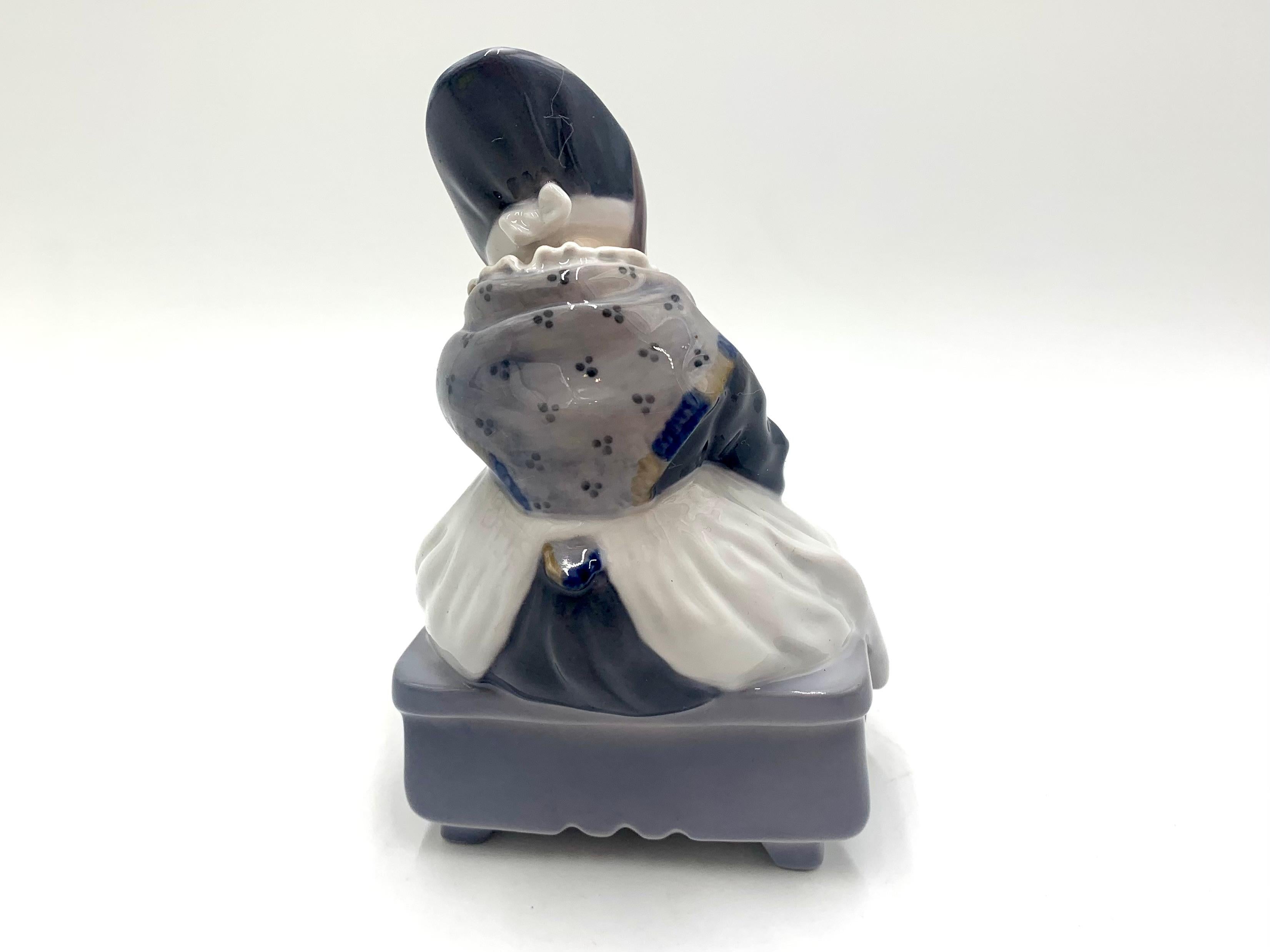 Mid-Century Modern Porcelain Figurine of a Sewing Woman, Royal Copenhagen, Denmark For Sale