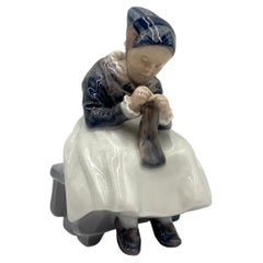 Porcelain Figurine of a Sewing Woman, Royal Copenhagen, Denmark