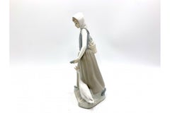 Porcelain Figurine of a Woman with a Goose, Nao Lladro, Spain