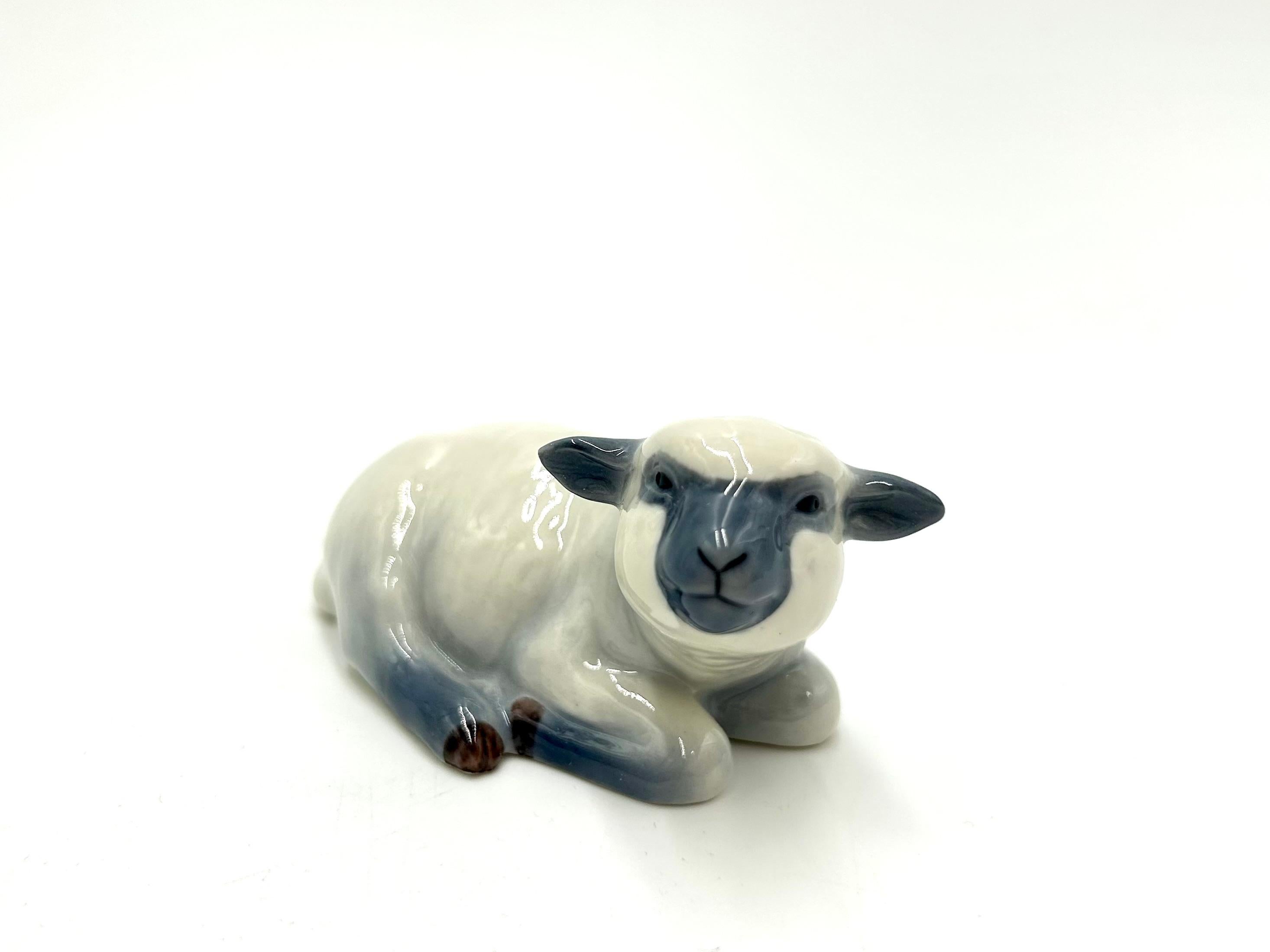 Porcelain sheep figurine

Produced by the Danish manufacture Royal Copenhagen

Contemporary production

Very good condition without damage

Measures: height: 4cm

width: 7cm

depth: 4cm.