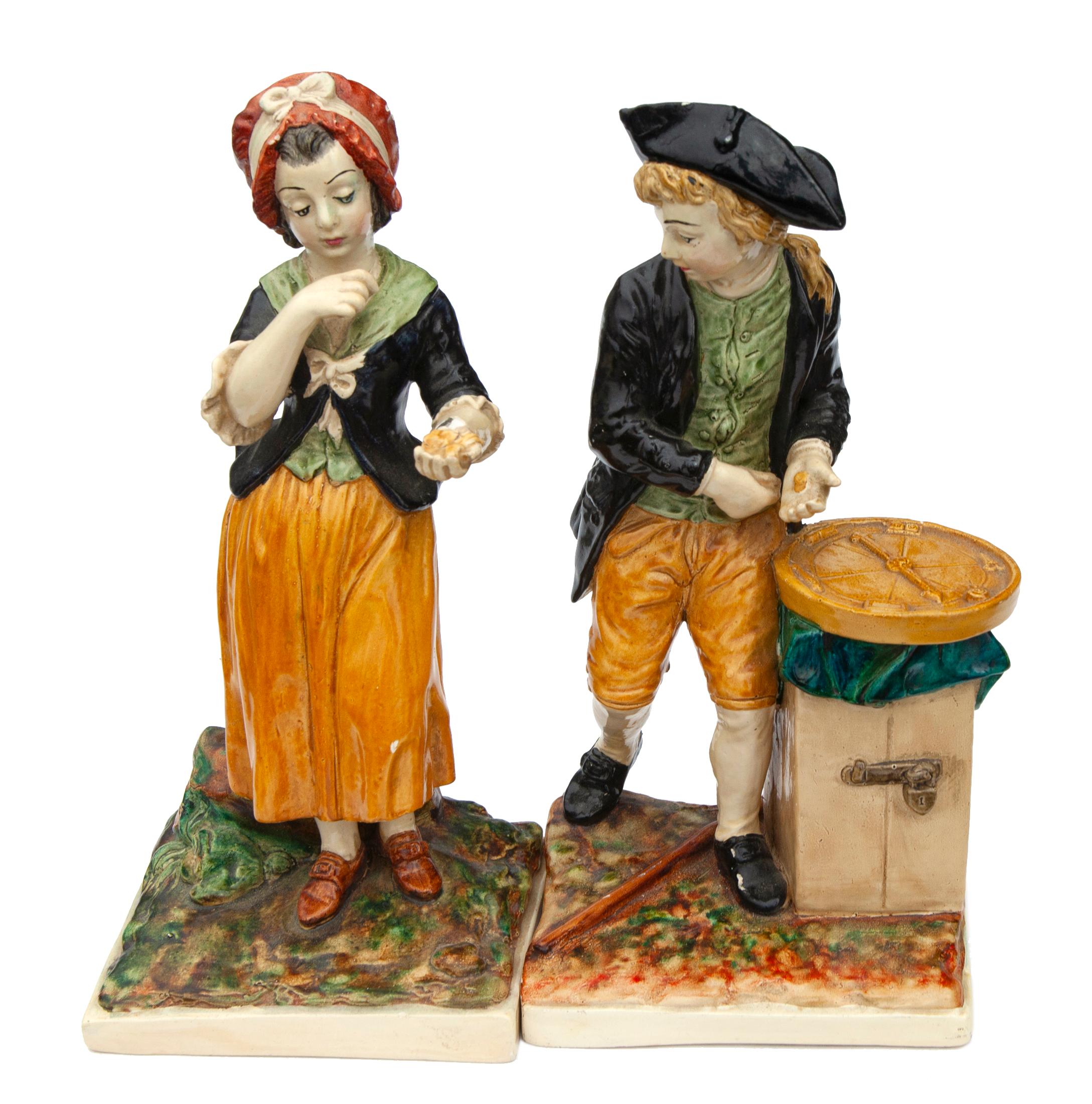 Vintage Niepold Borghese chalkware figurines of a man & woman traveling pair.
 