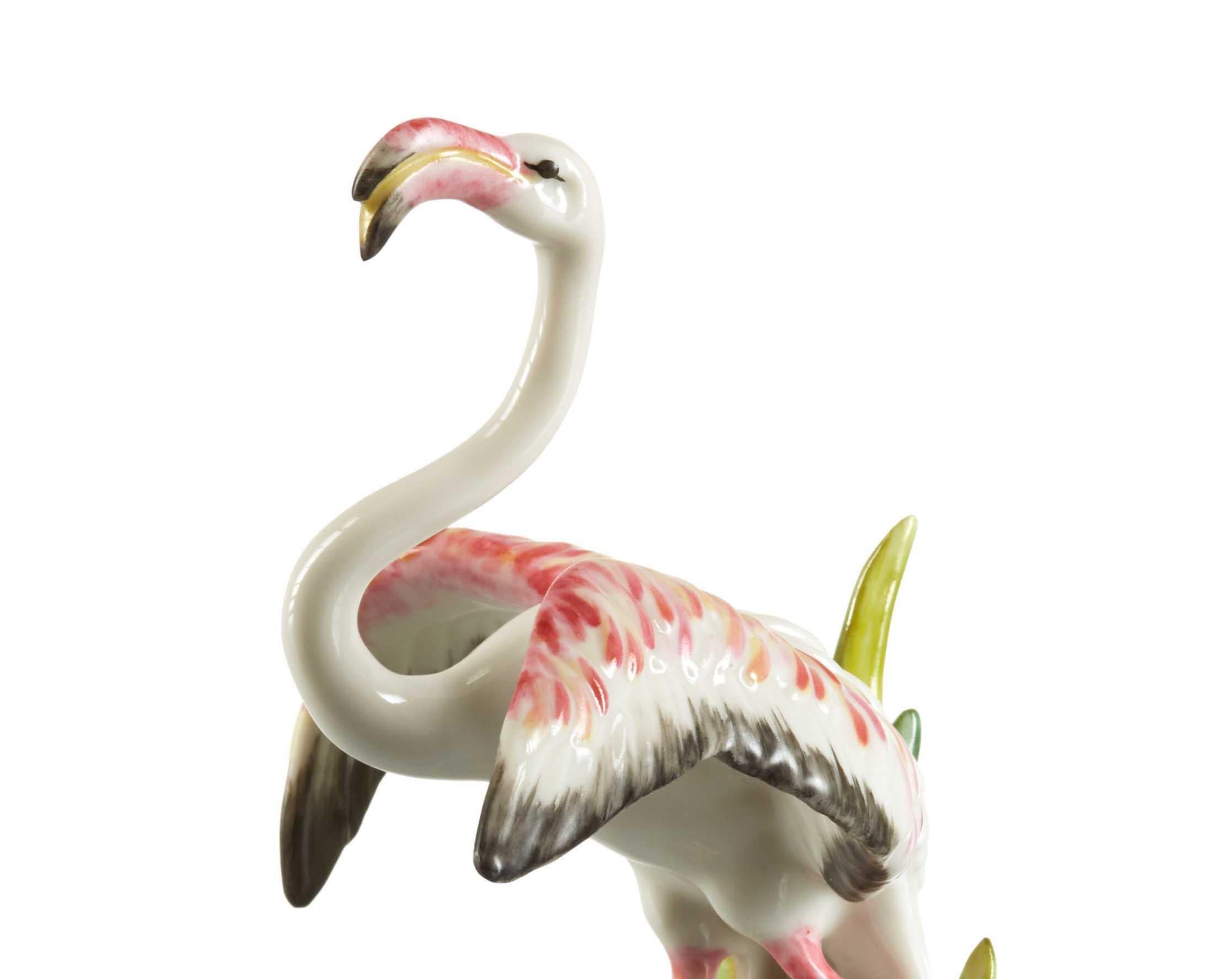 This handcrafted and hand painted flamingo was designed by Luise Terletzki Scherf. She was a master of capturing the character of the animals and has created a menagerie of animals for Nymphenburg. They are hand cast and hand painted by the